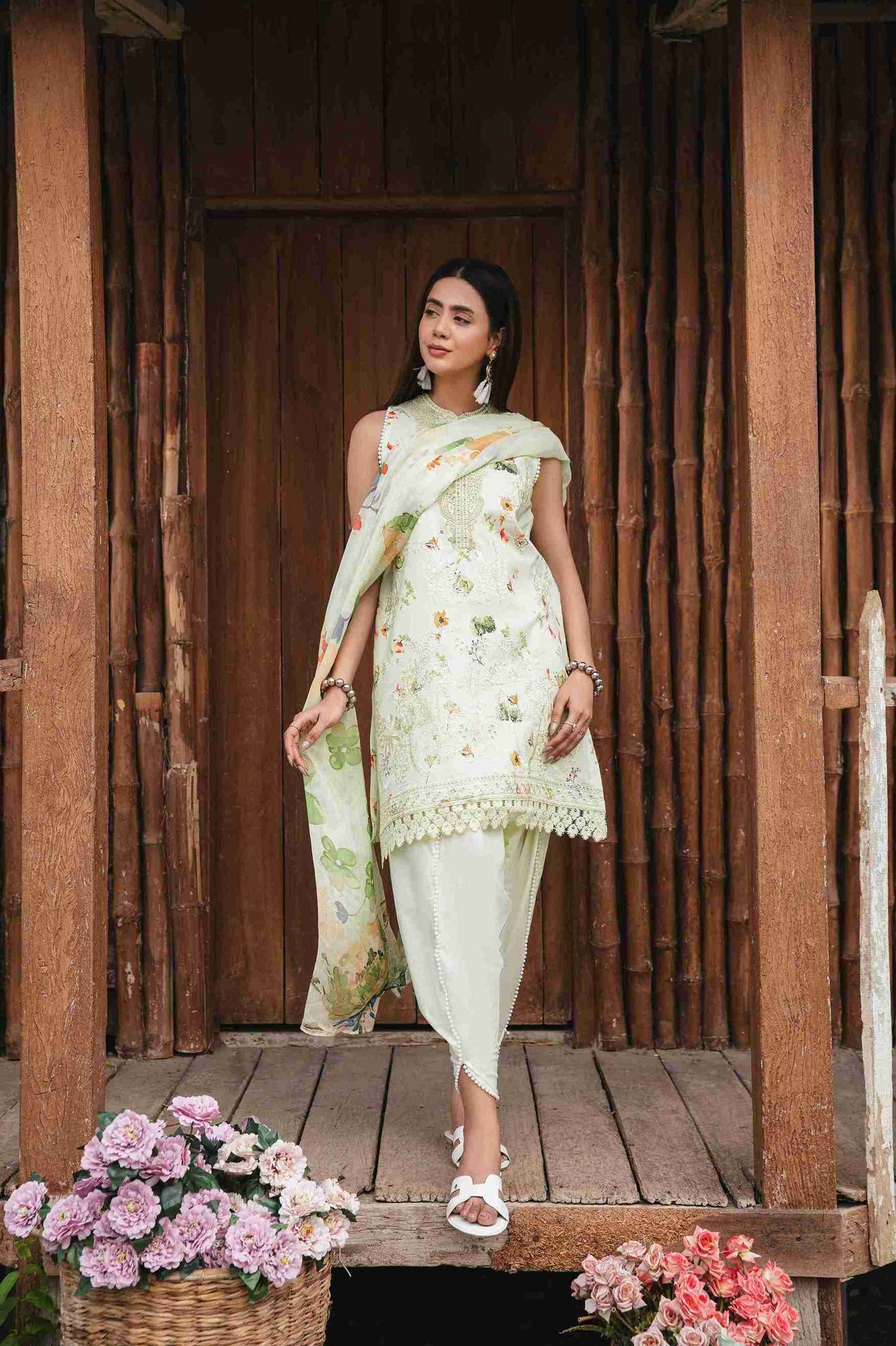 Embroidered lawn suit with chiffon dupatta and matching cotton trouser.