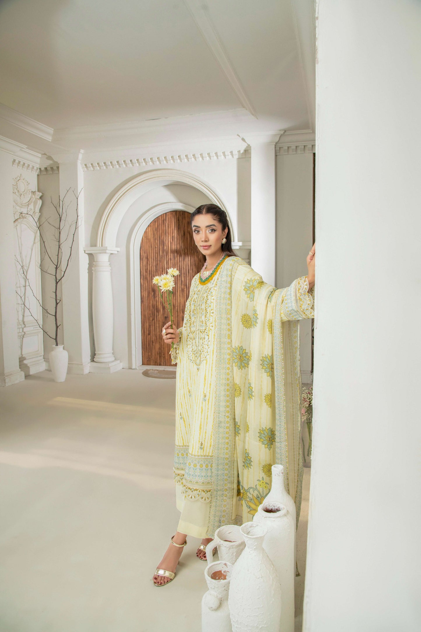 Embroidered shirt styled with lawn trouser