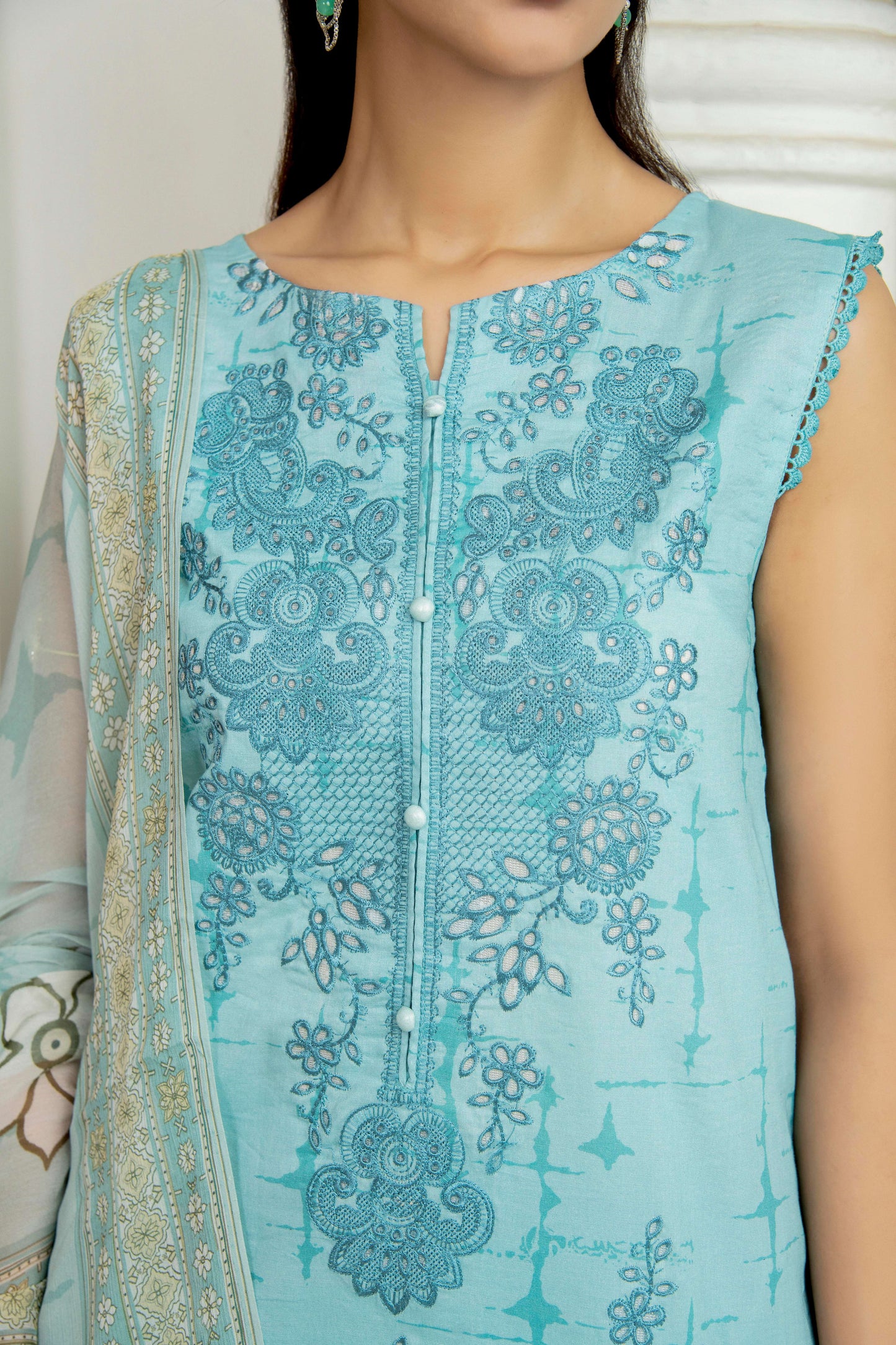 Embroidered shirt styled with dupatta.