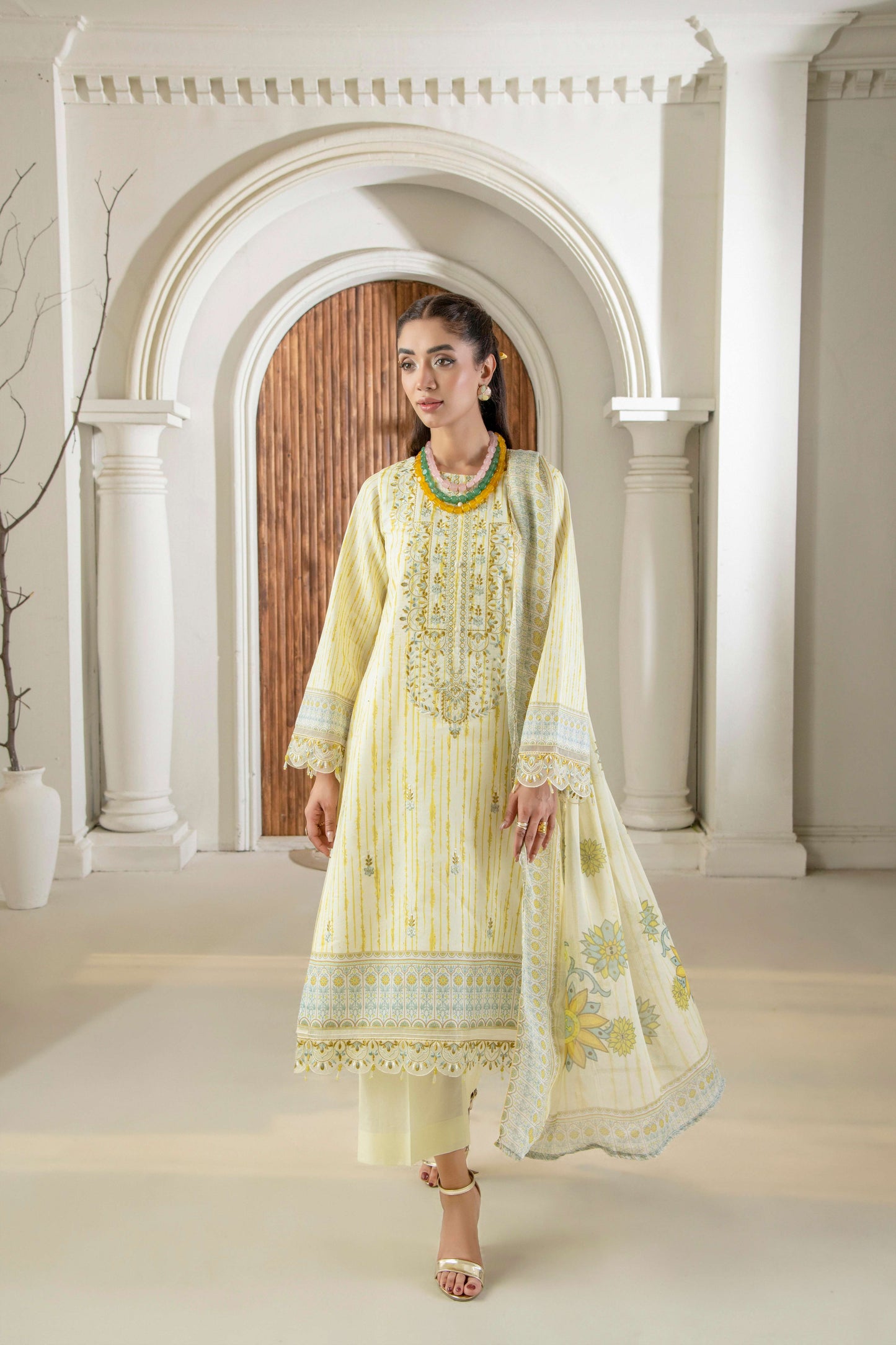Embroidered kurta styled with plain trouser