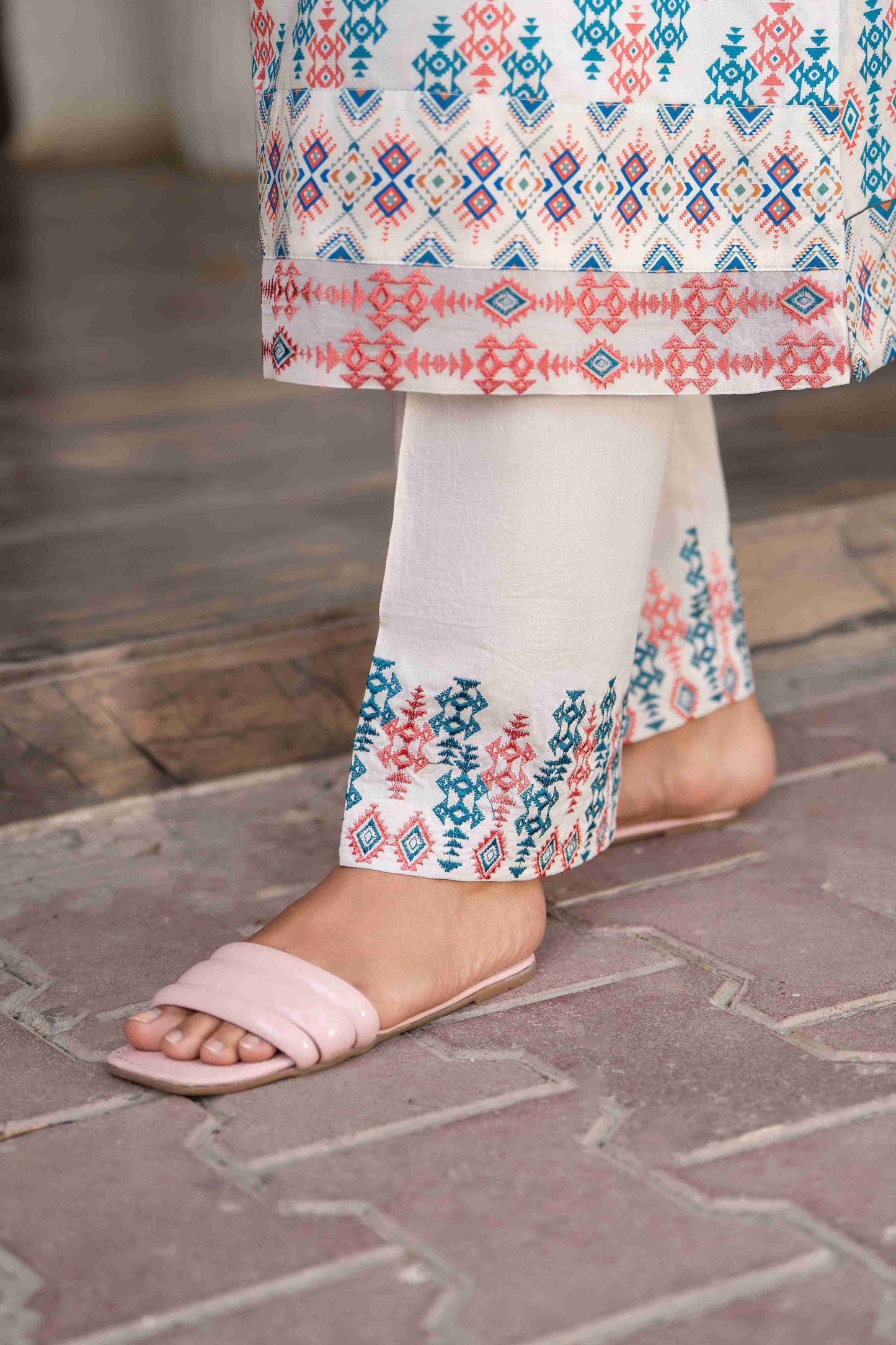 Women’s premium summer outfit with embroidered kurta, cotton trouser, and chiffon dupatta styled for eastern elegance