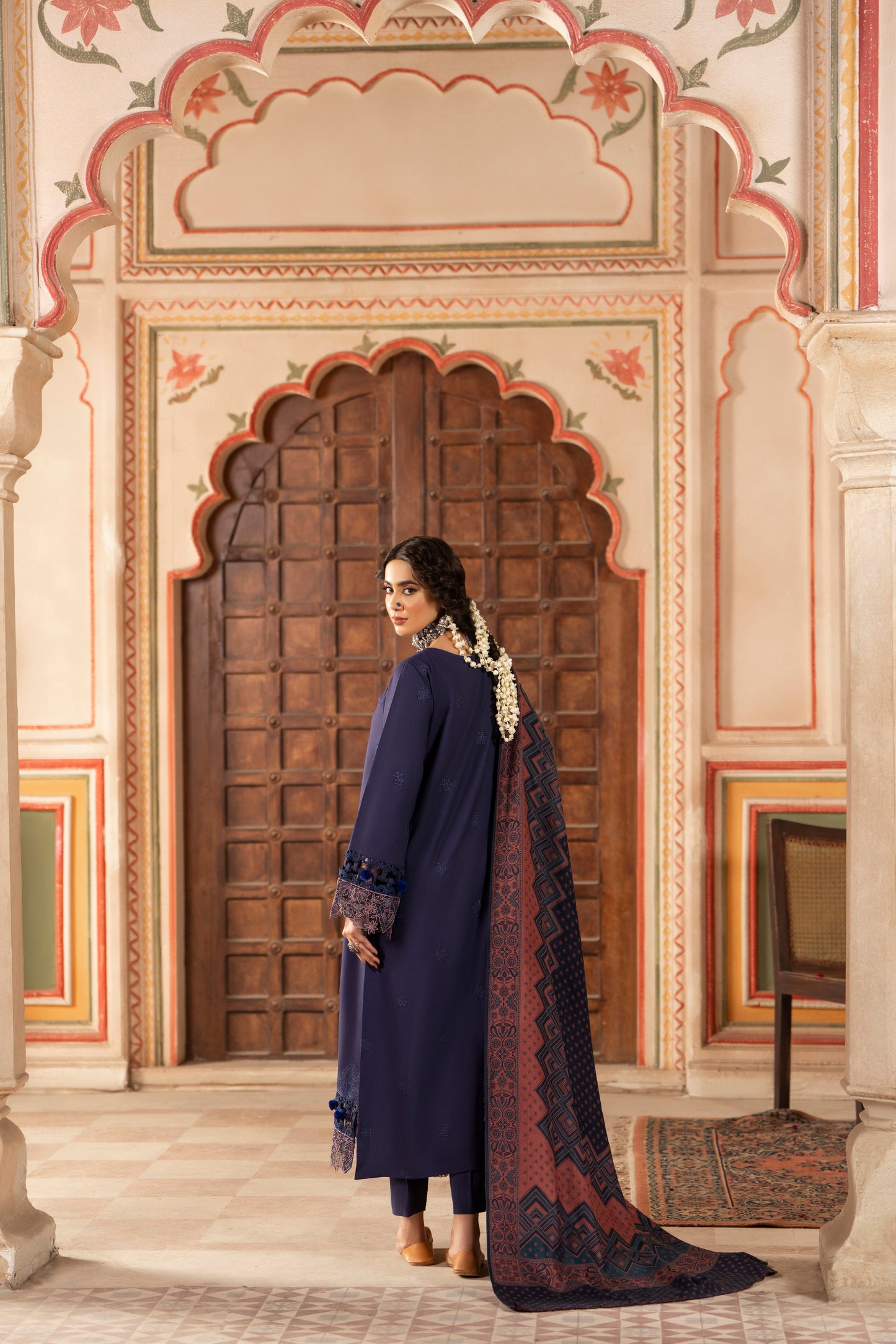Stylish unstitched winter suit designed with a soft jacquard wool shawl and intricate embroidered shirt