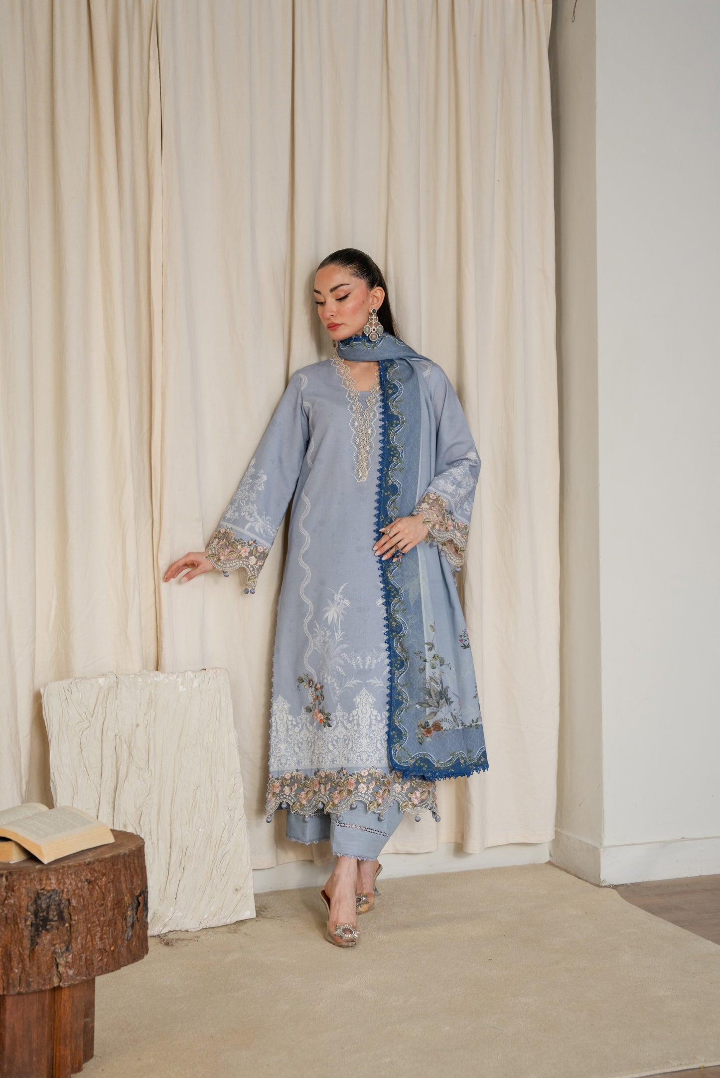 Winter suit with organza neckline and daman embroidery plus dyed trousers.
