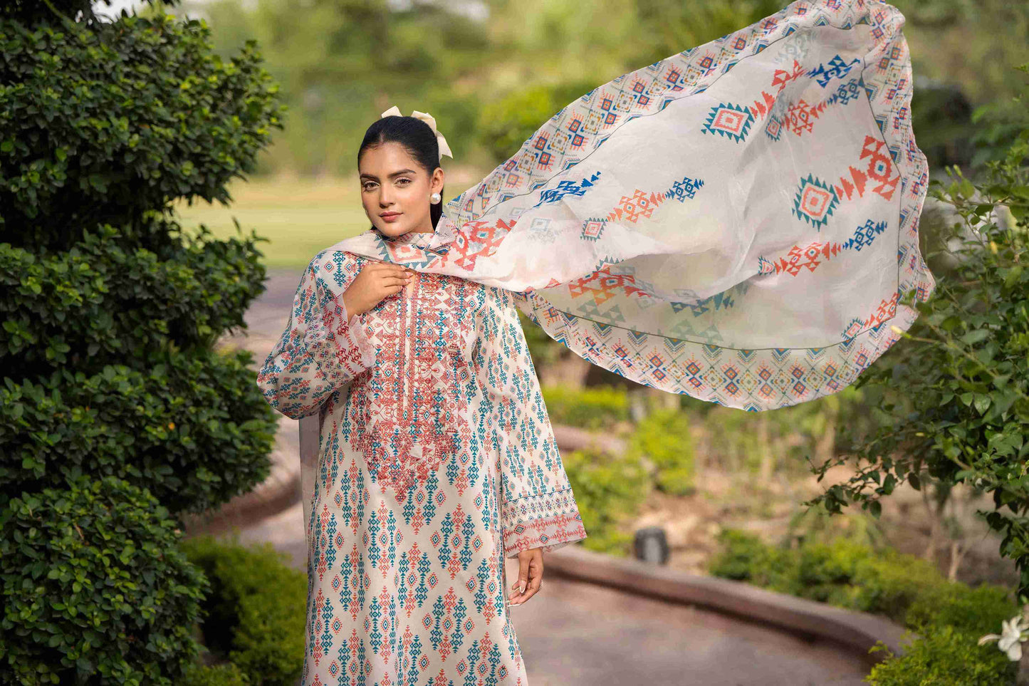 Premium lawn shirt with embroidered neckline and chiffon dupatta paired with a pure cotton trouser for modern comfort