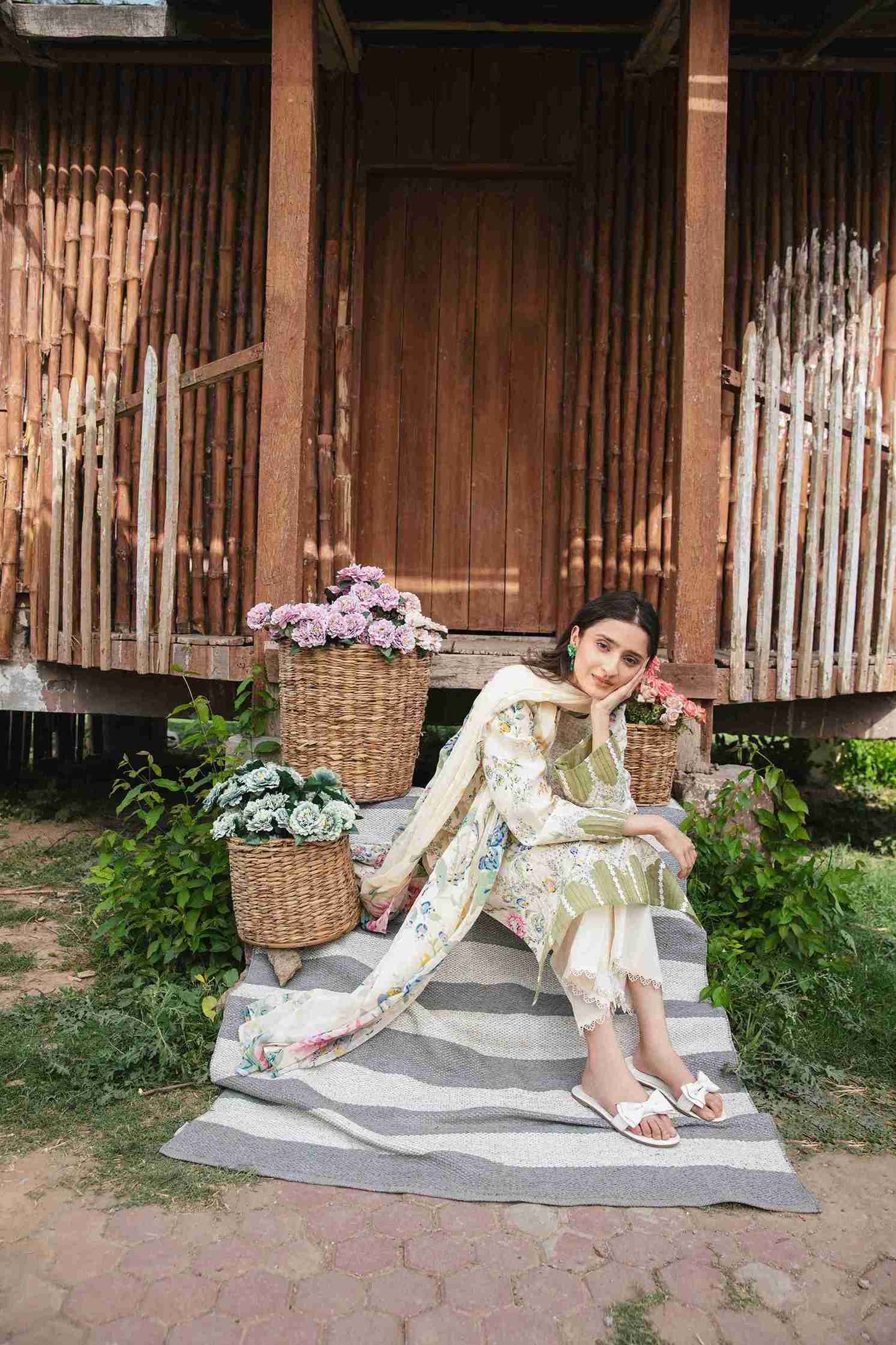 Embroidered lawn suit paired with chiffon dupatta and cotton trouser