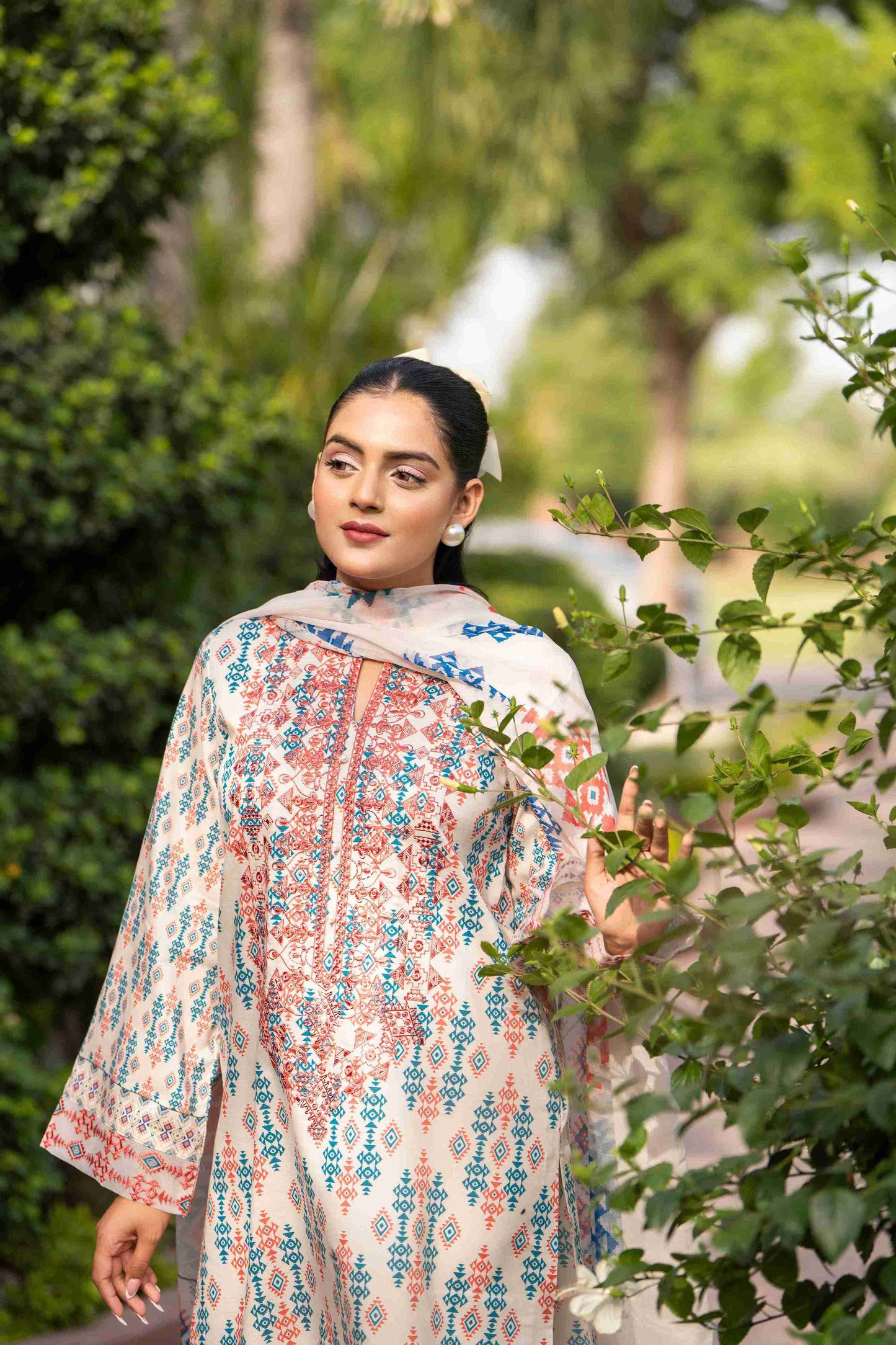 Summer-ready kurta crafted from branded lawn with delicate embroidery, styled with chiffon dupatta and cotton trouser