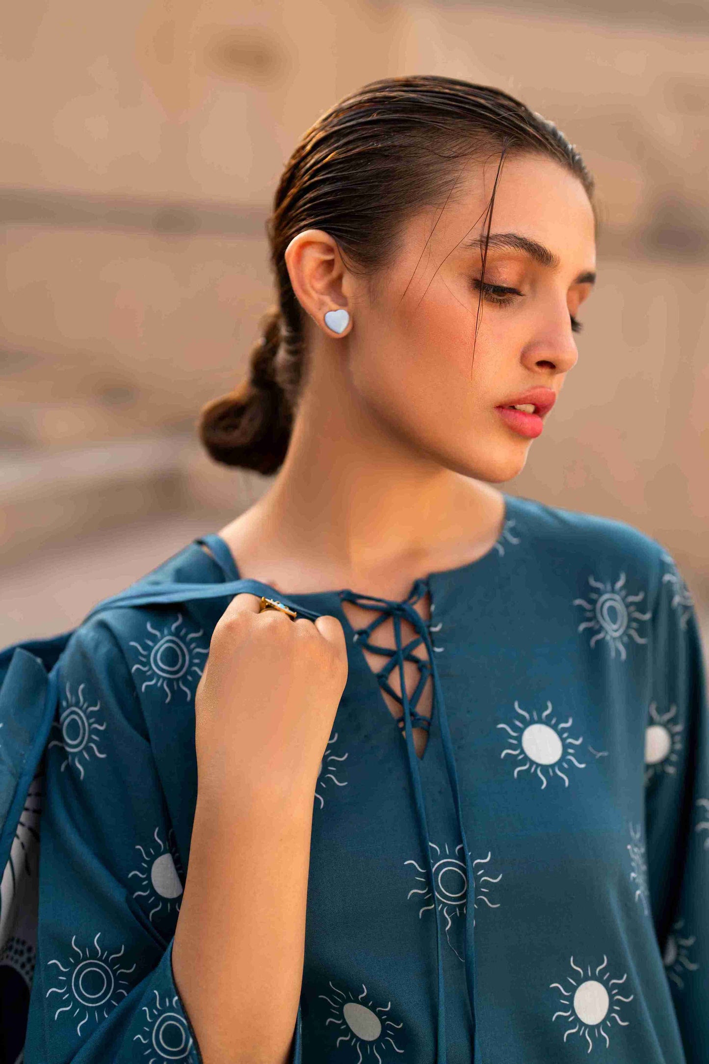Elegant stitched Jacquard suit featuring embroidered kurta and cotton bell bottom trousers