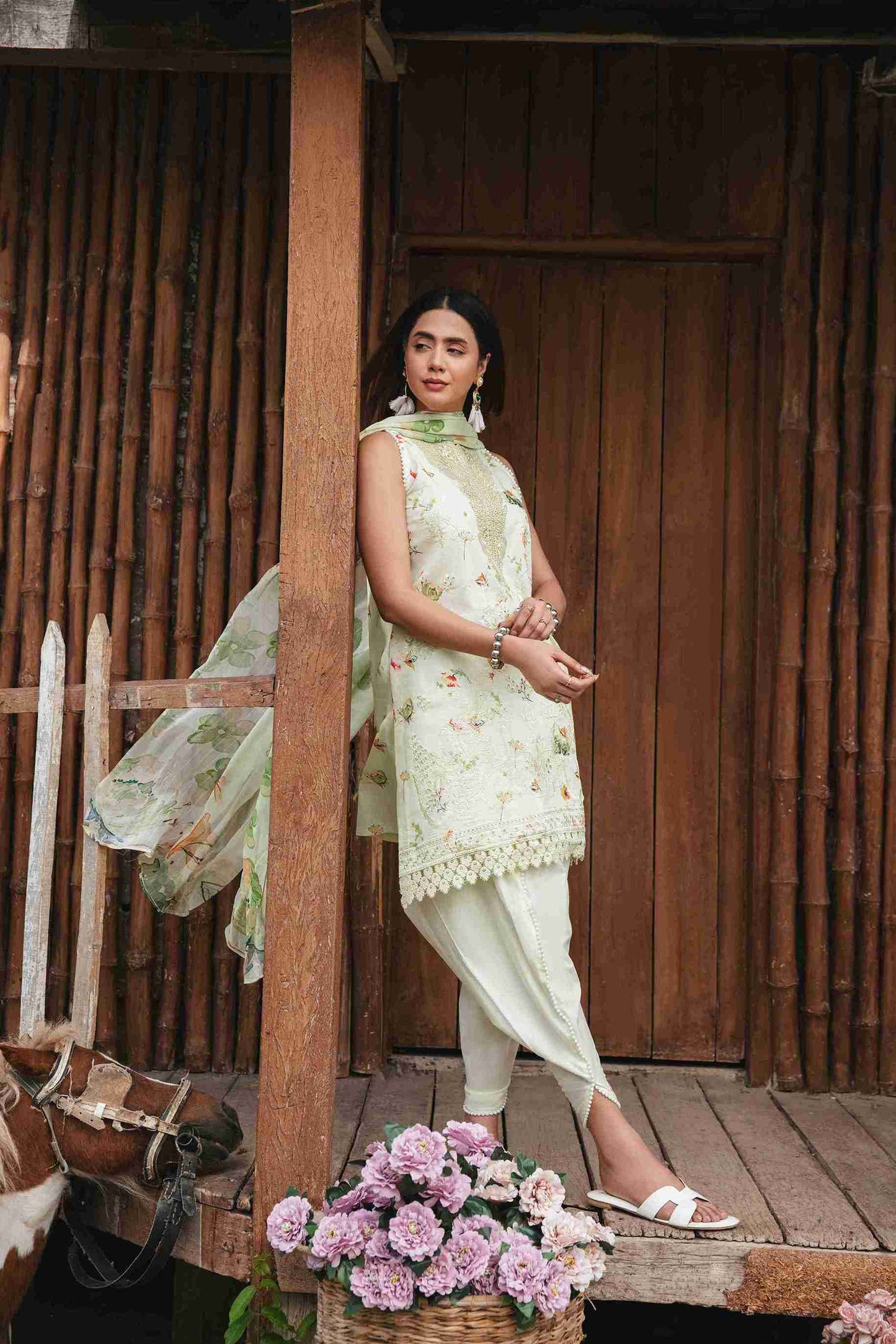Embroidered lawn kurta with chiffon dupatta and plain dyed cotton trouser.