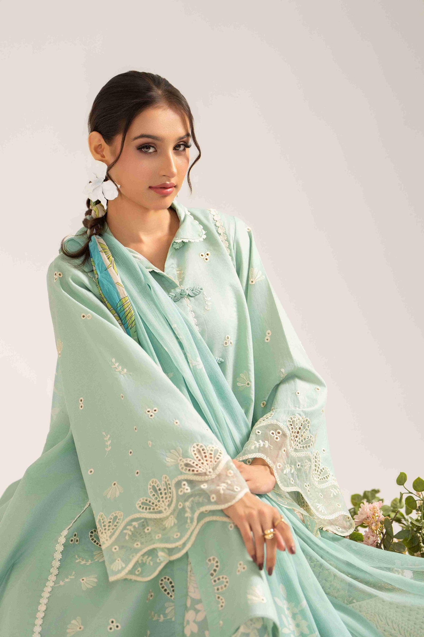 Printed embroidered lawn shirt styled with chiffon dupatta and plain cotton trouser.