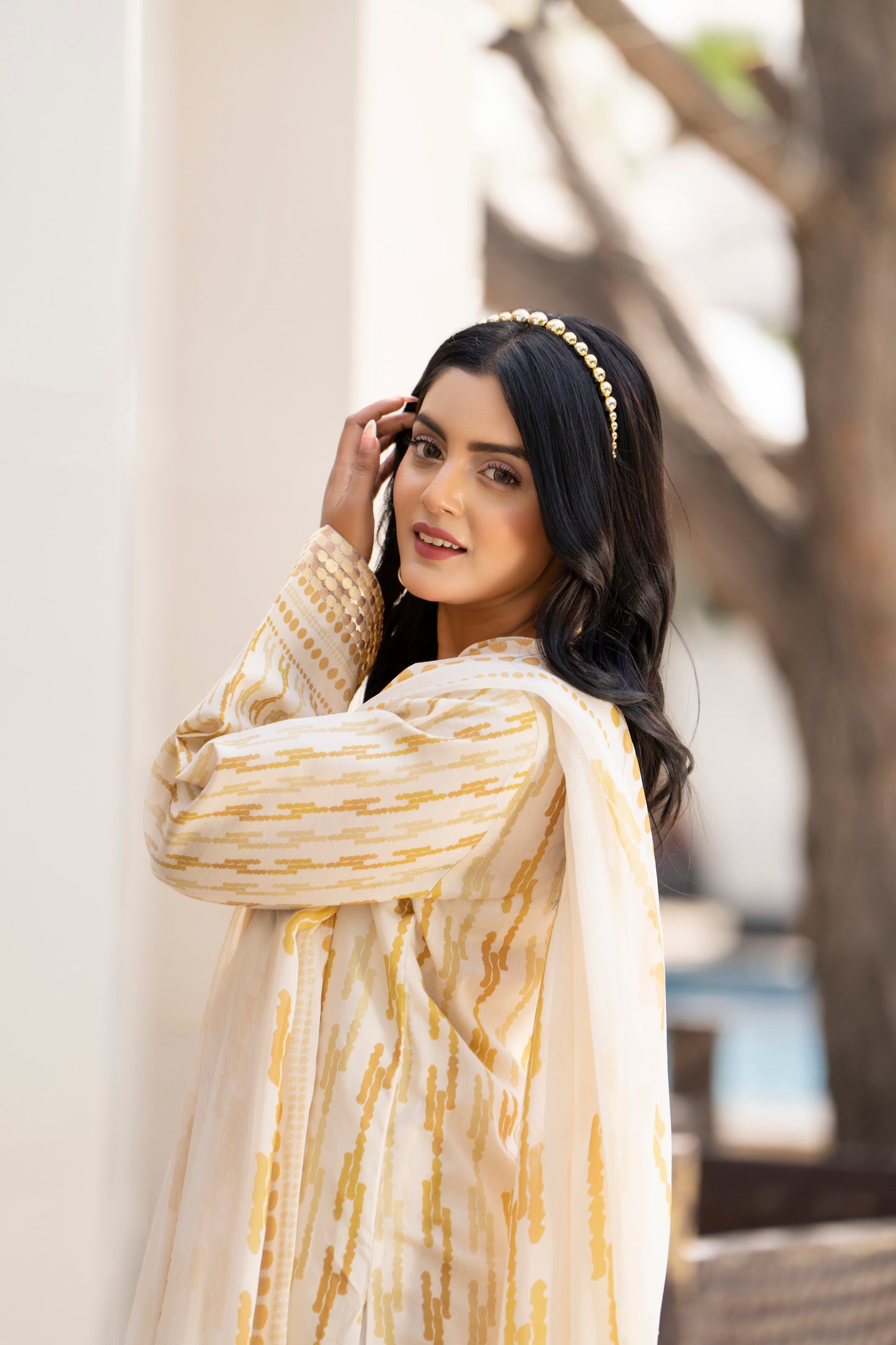 A versatile dress with an embroidered neckline and chiffon dupatta, perfect for lunches, gatherings, or casual evenings