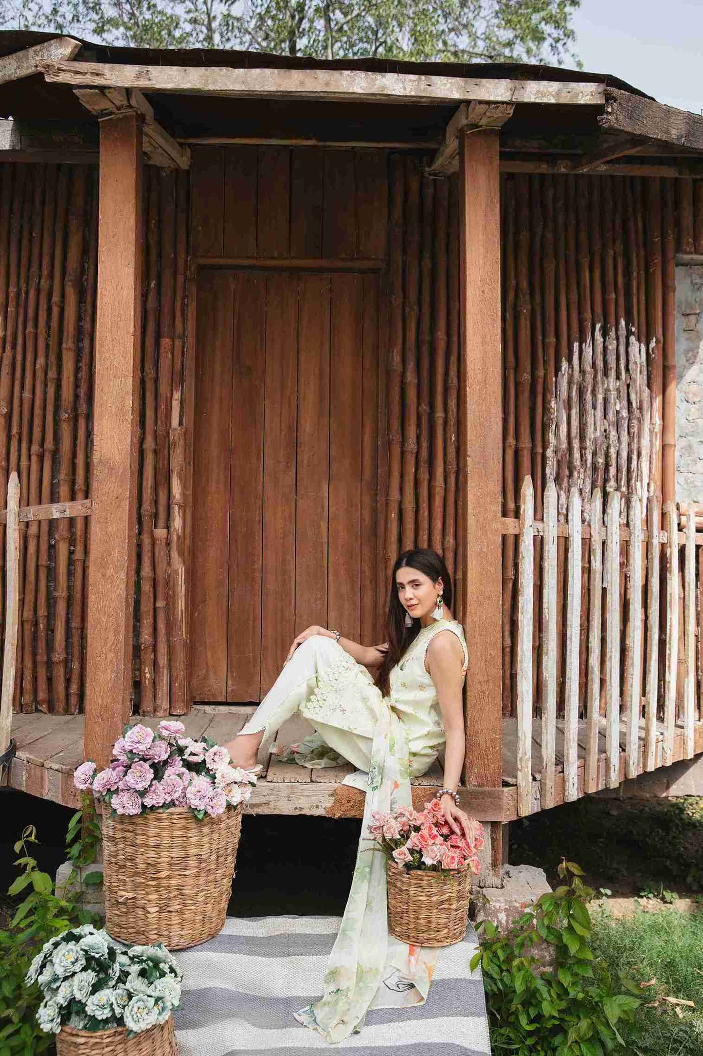 Fancy embroidered lawn outfit with chiffon dupatta and plain trouser.