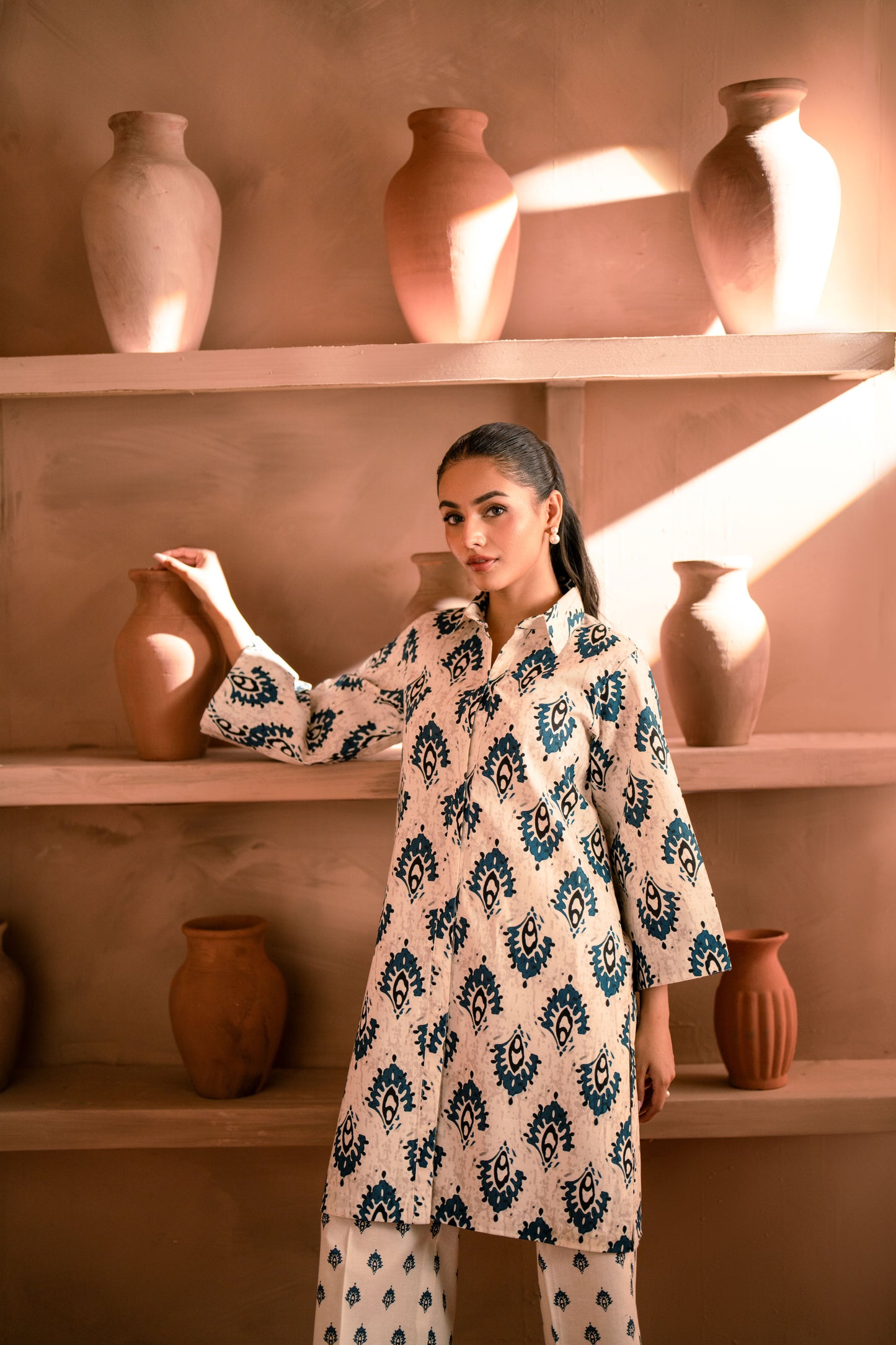 Formal unstitched khaddar winter dress for women with charming printed details