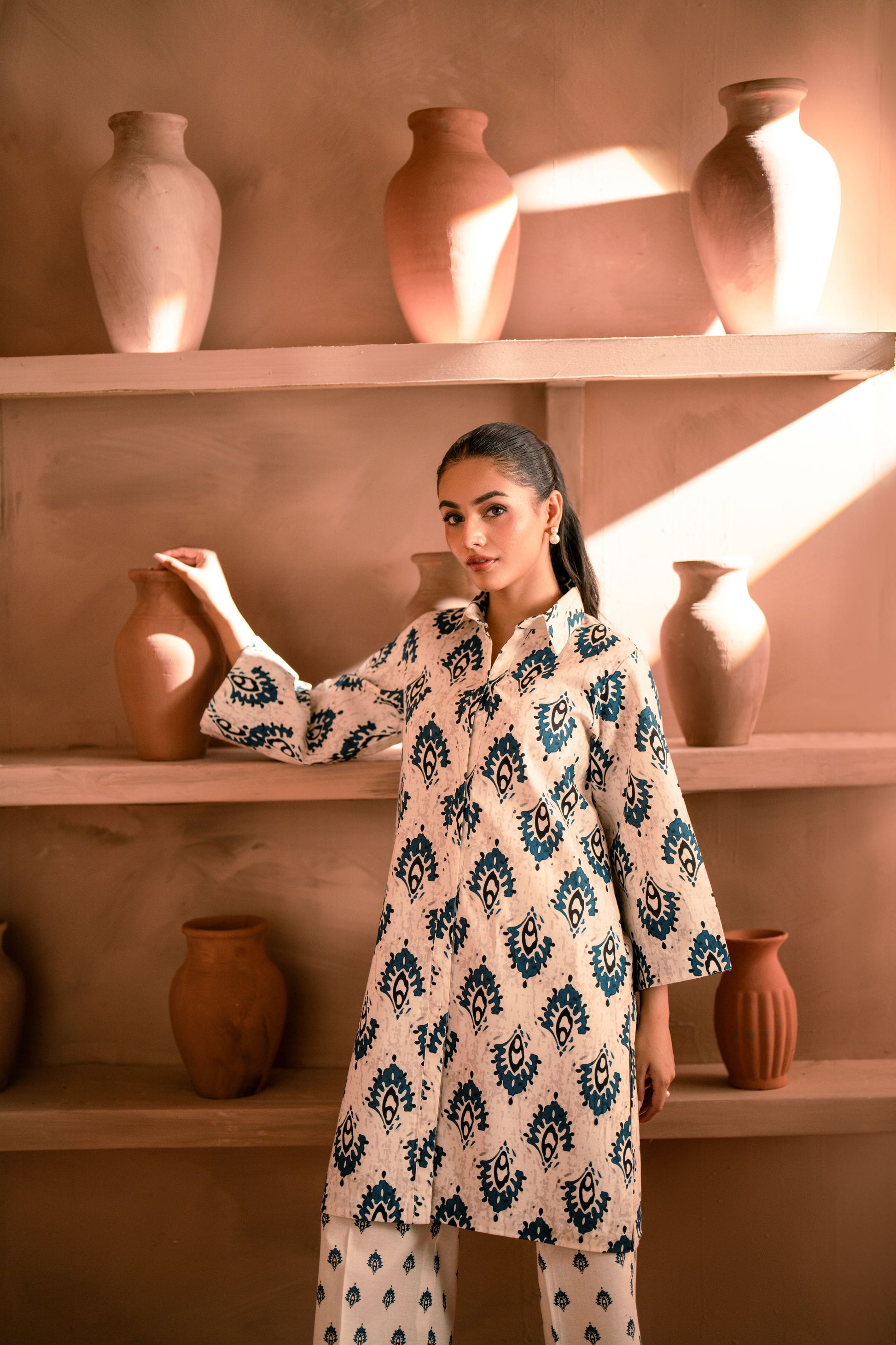 Formal unstitched khaddar winter dress for women with charming printed details