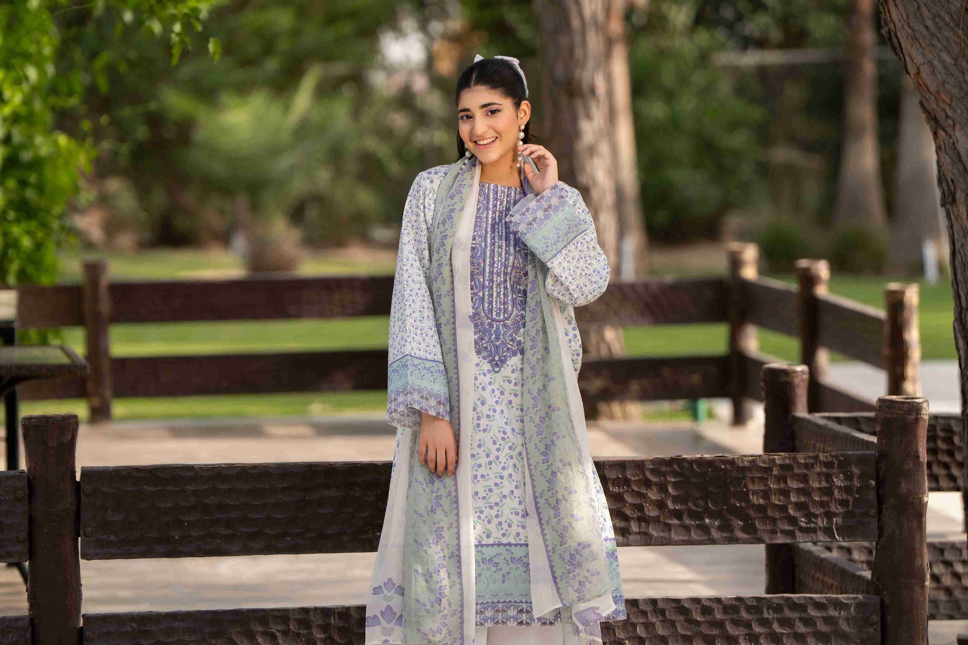 Embroidered neckline kurta with unique summer colors, styled with chiffon dupatta and cotton trouser