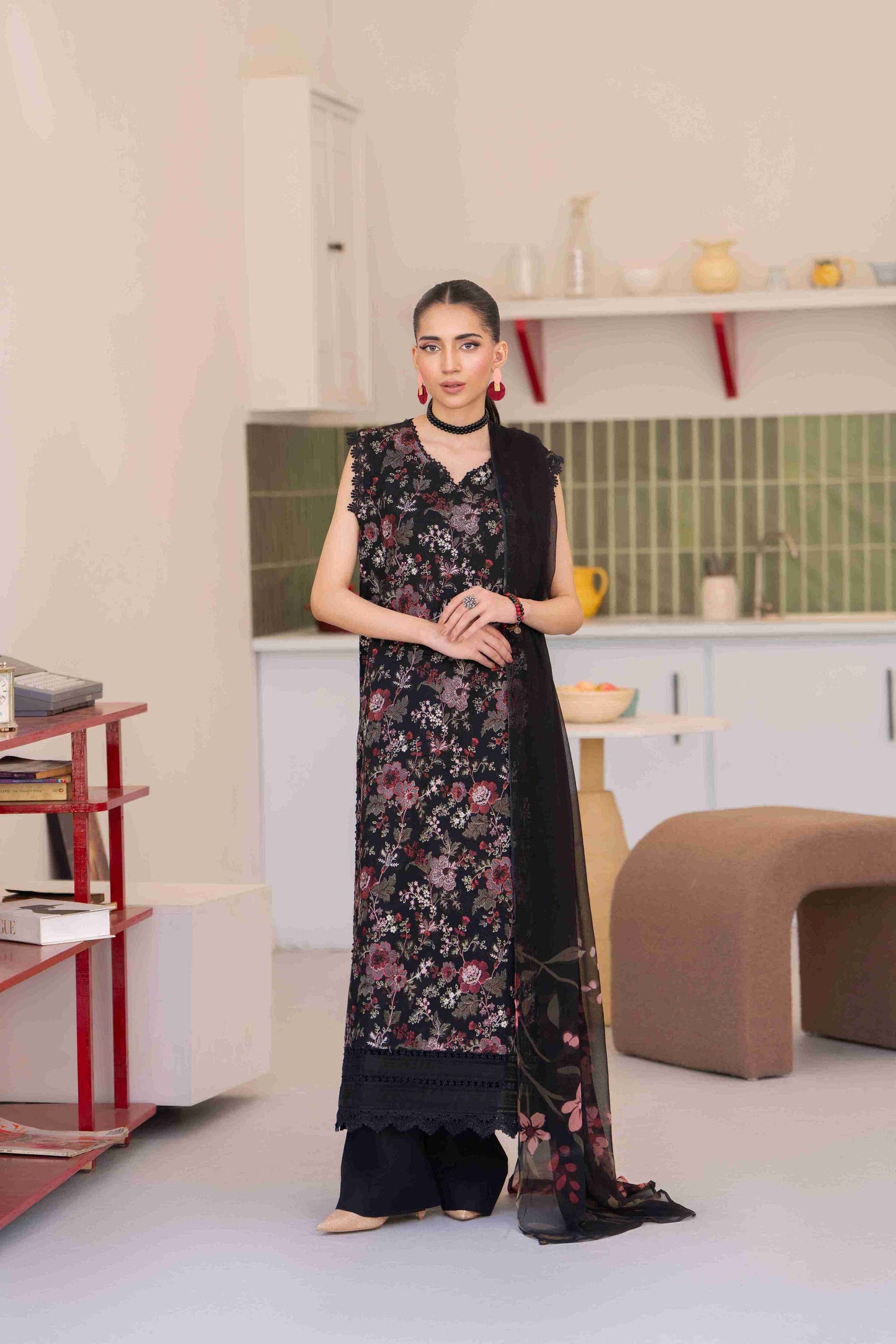  Unstitched three piece designer lawn suit featuring breeze embroidered lawn shirt, soft chiffon dupatta and plain cotton trouser