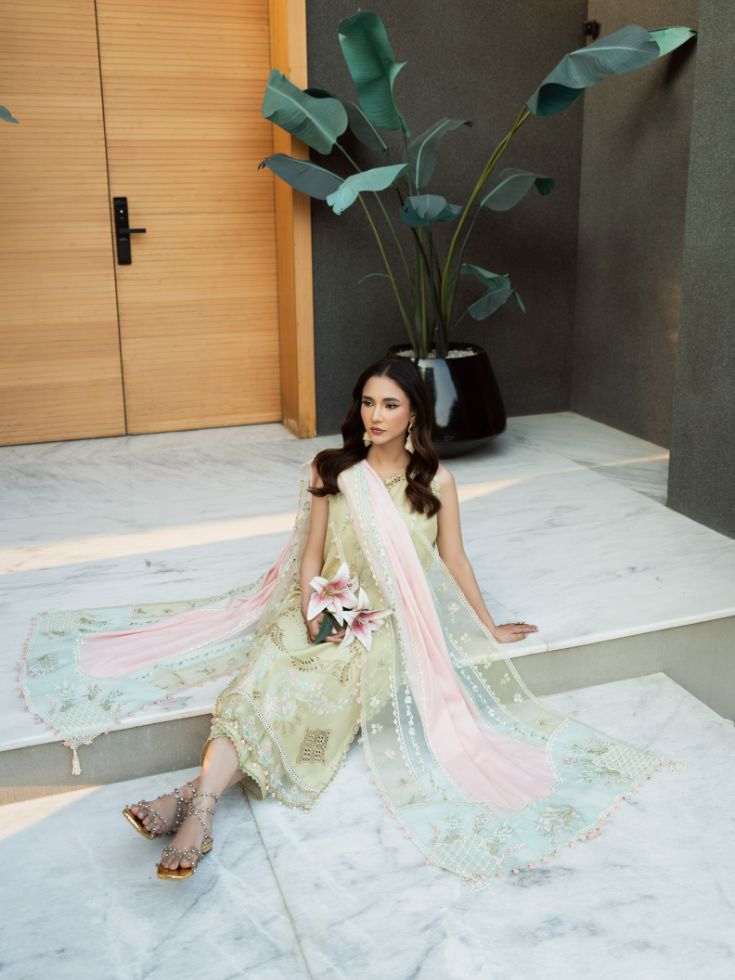 Bridal-inspired yellow lawn outfit with organza patch, motifs, and cotton embroidered dupatta