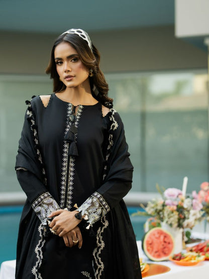 Embroidered lawn suit featuring motifs, patch, and cotton dupatta