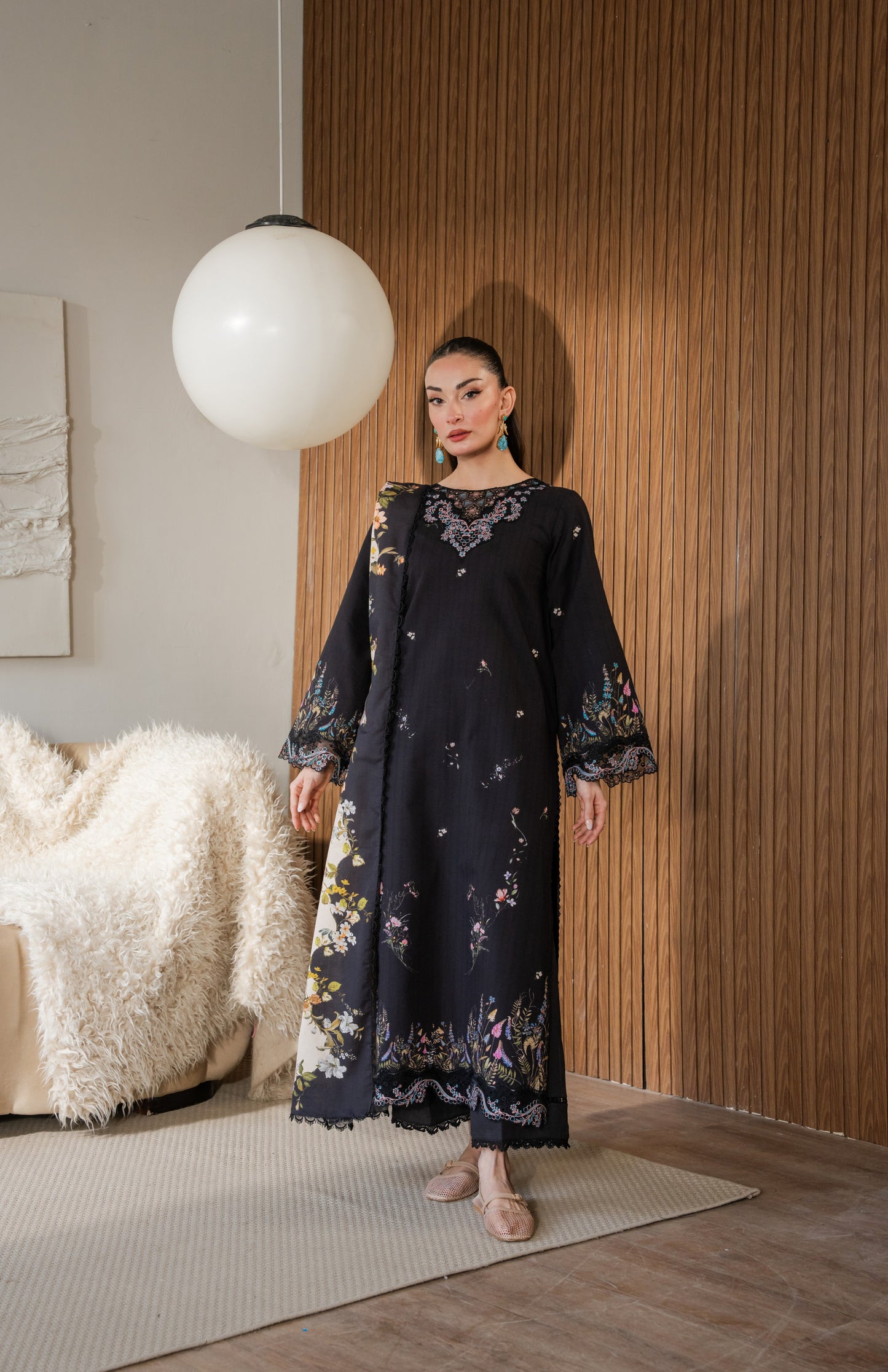 Printed khaddar shirt with simple dyed trousers and light organza embroidery.