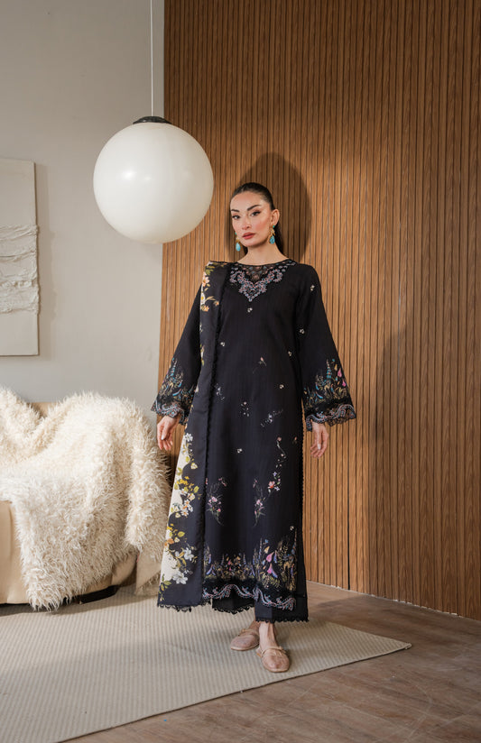 Printed khaddar shirt with simple dyed trousers and light organza embroidery.