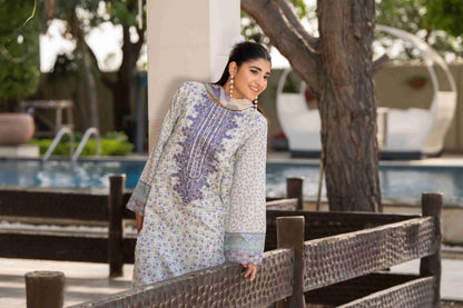 Stylish summer lawn kurta featuring embroidered neckline, chiffon dupatta, and comfortable trouser