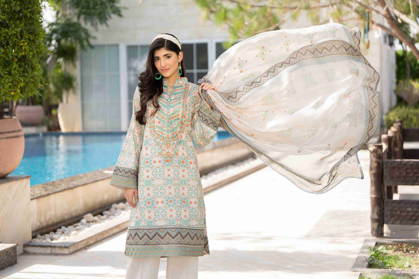 Stylish embroidered lawn shirt paired with chiffon dupatta and cotton trouser for a modern touch