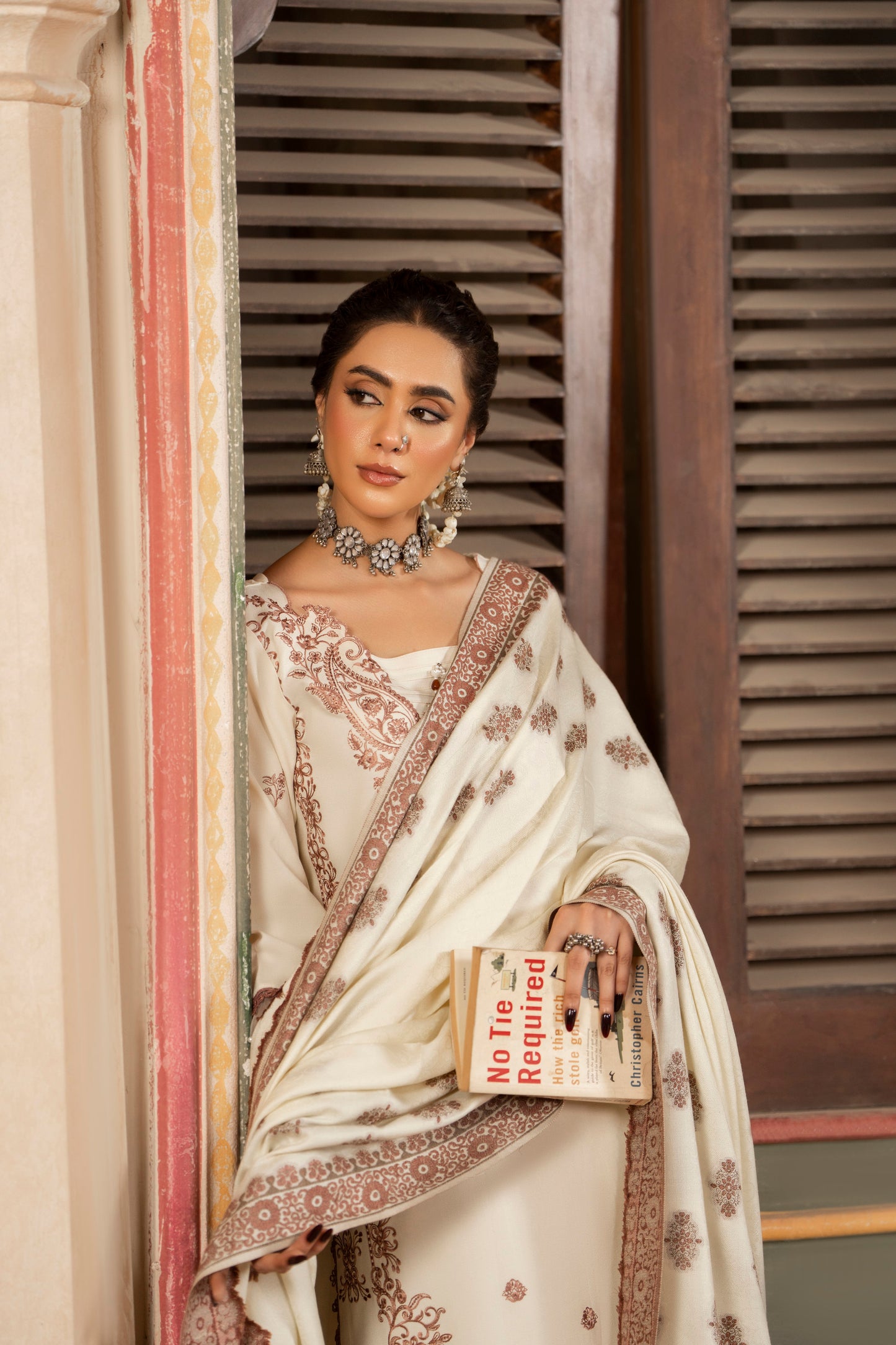 Rich jacquard wool shawl paired with delicate embroidered Dhanak shirt and plain trousers.