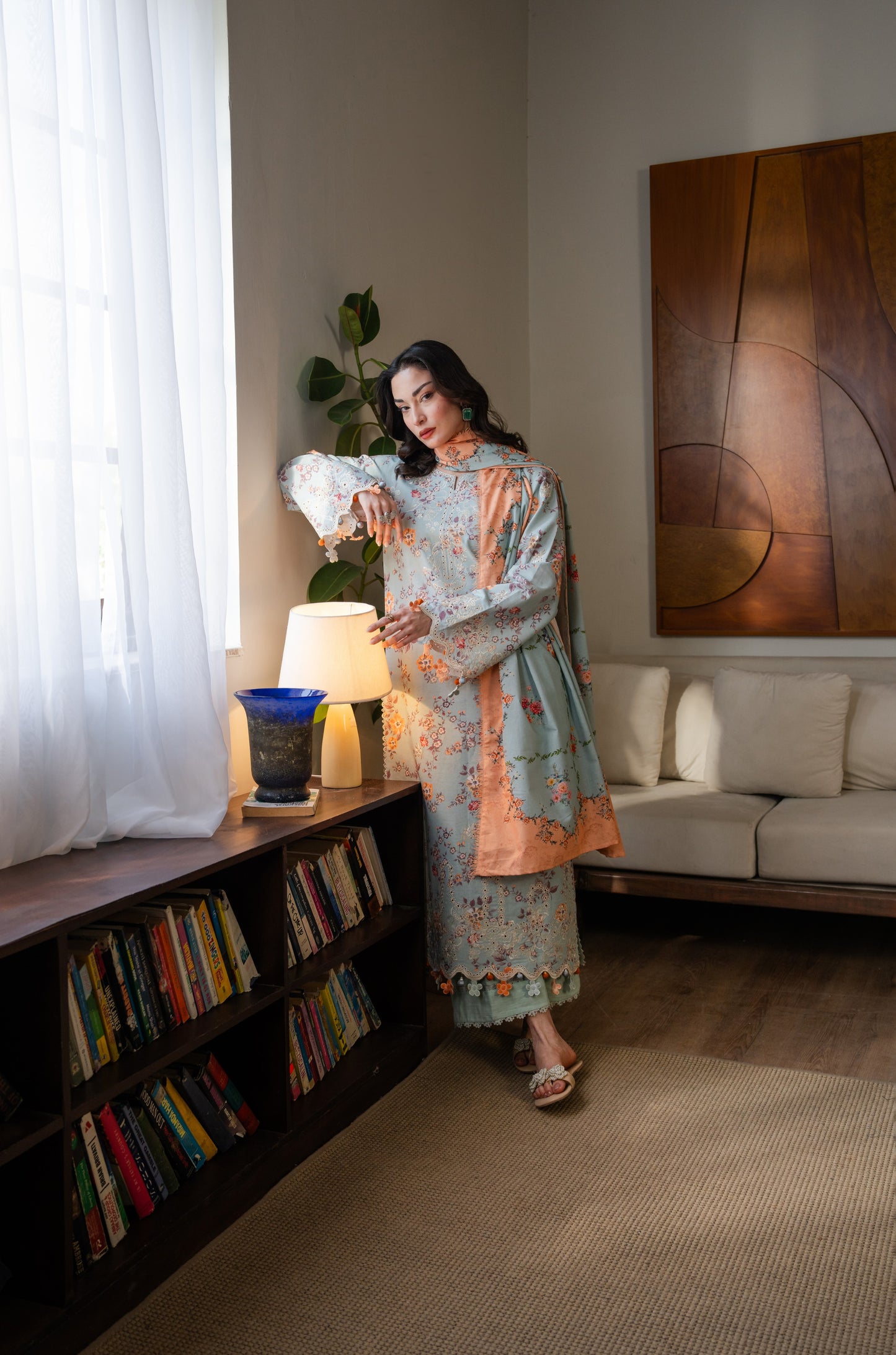 Traditional winter khaddar dress with delicate organza embroidery and stylish printed dupatta.