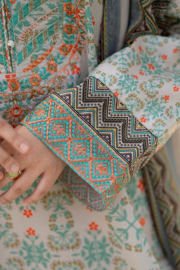 Unique embroidered lawn kurta with chiffon dupatta and cotton trouser, styled for comfort and elegance