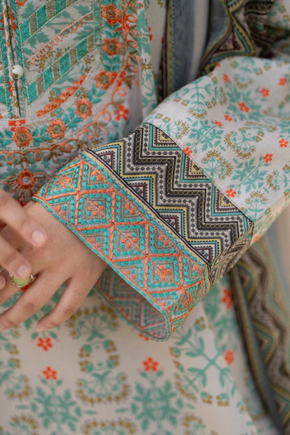 Unique embroidered lawn kurta with chiffon dupatta and cotton trouser, styled for comfort and elegance
