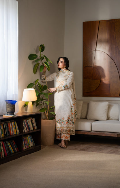 Winter printed khaddar shirt with fine organza neckline embroidery and matching dupatta.