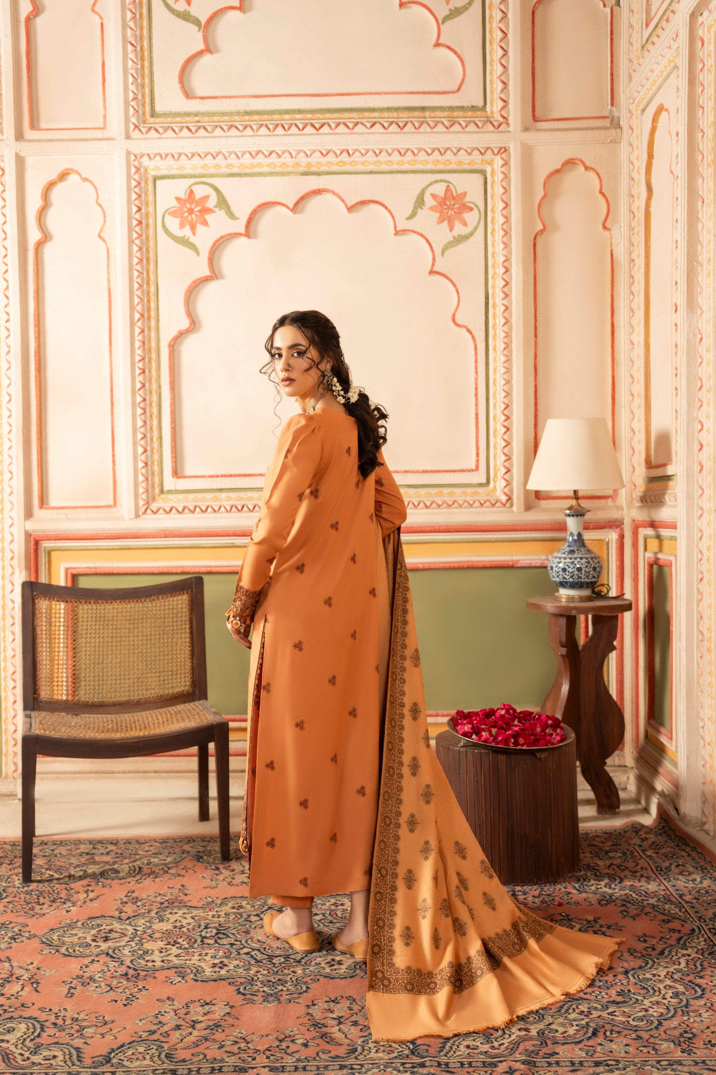 Soft embroidered Dhanak fabric paired with warm jacquard shawl for winter comfort.