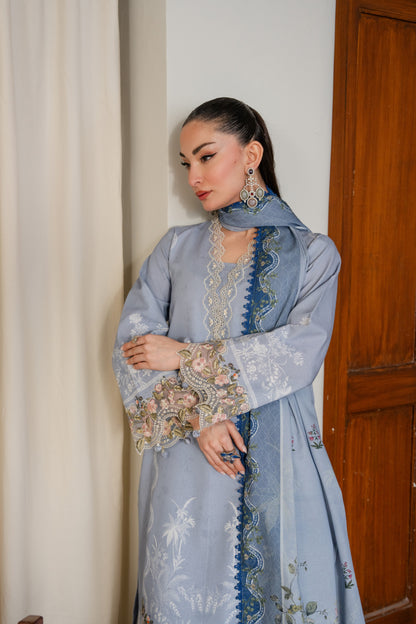 Warm khaddar dress with organza work and printed dupatta for winter comfort.