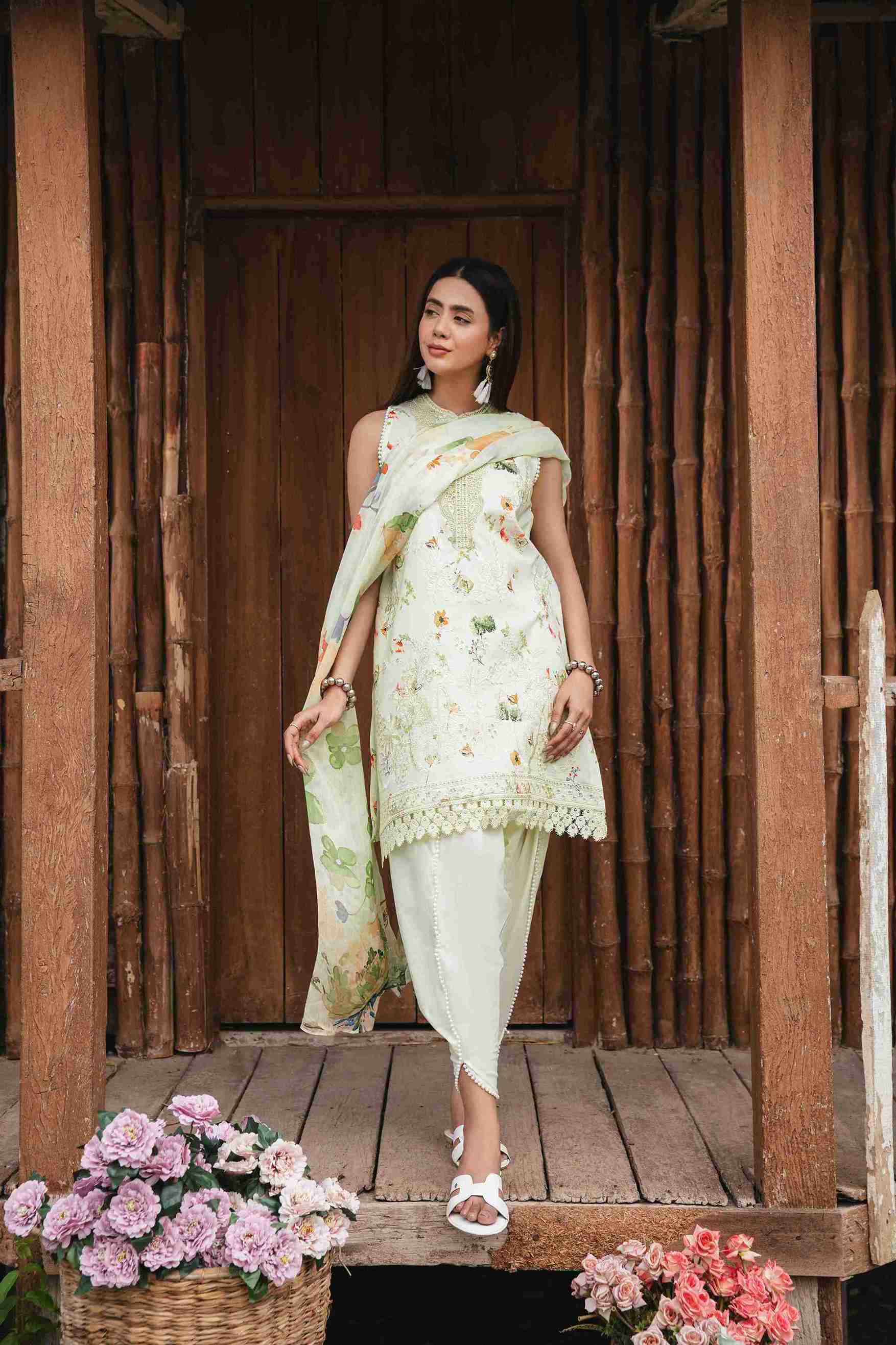 Embroidered lawn suit with chiffon dupatta and matching cotton trouser.