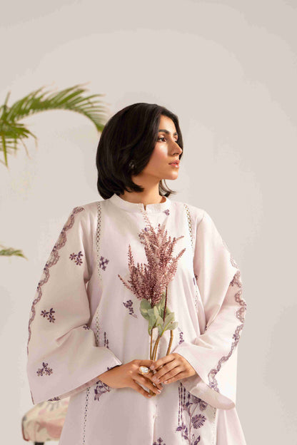 Designer embroidered lawn shirt matched with chiffon printed dupatta and cotton trouser.