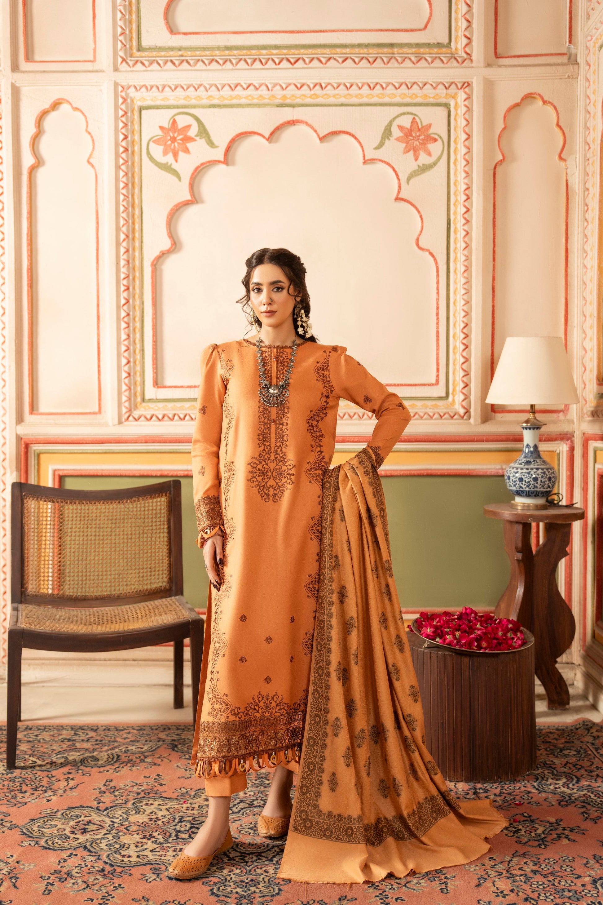 Beautiful embroidered winter top with warm jacquard shawl and minimal trouser.