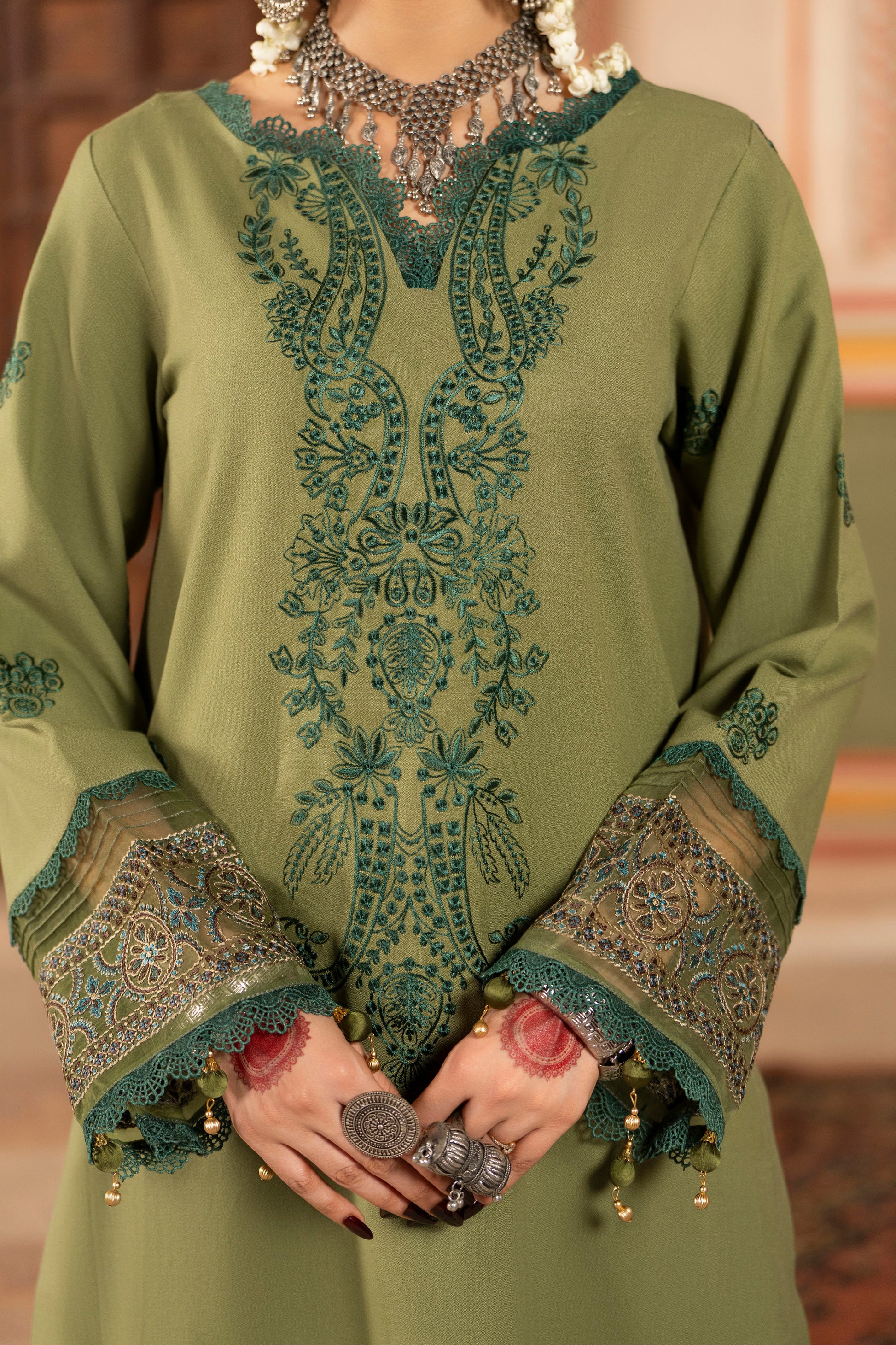Embroidered winter shirt in Dhanak fabric paired with a warm jacquard wool shawl and trouser.