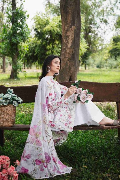 Designer lawn kurta with embroidery, chiffon dupatta, and plain trouser.
