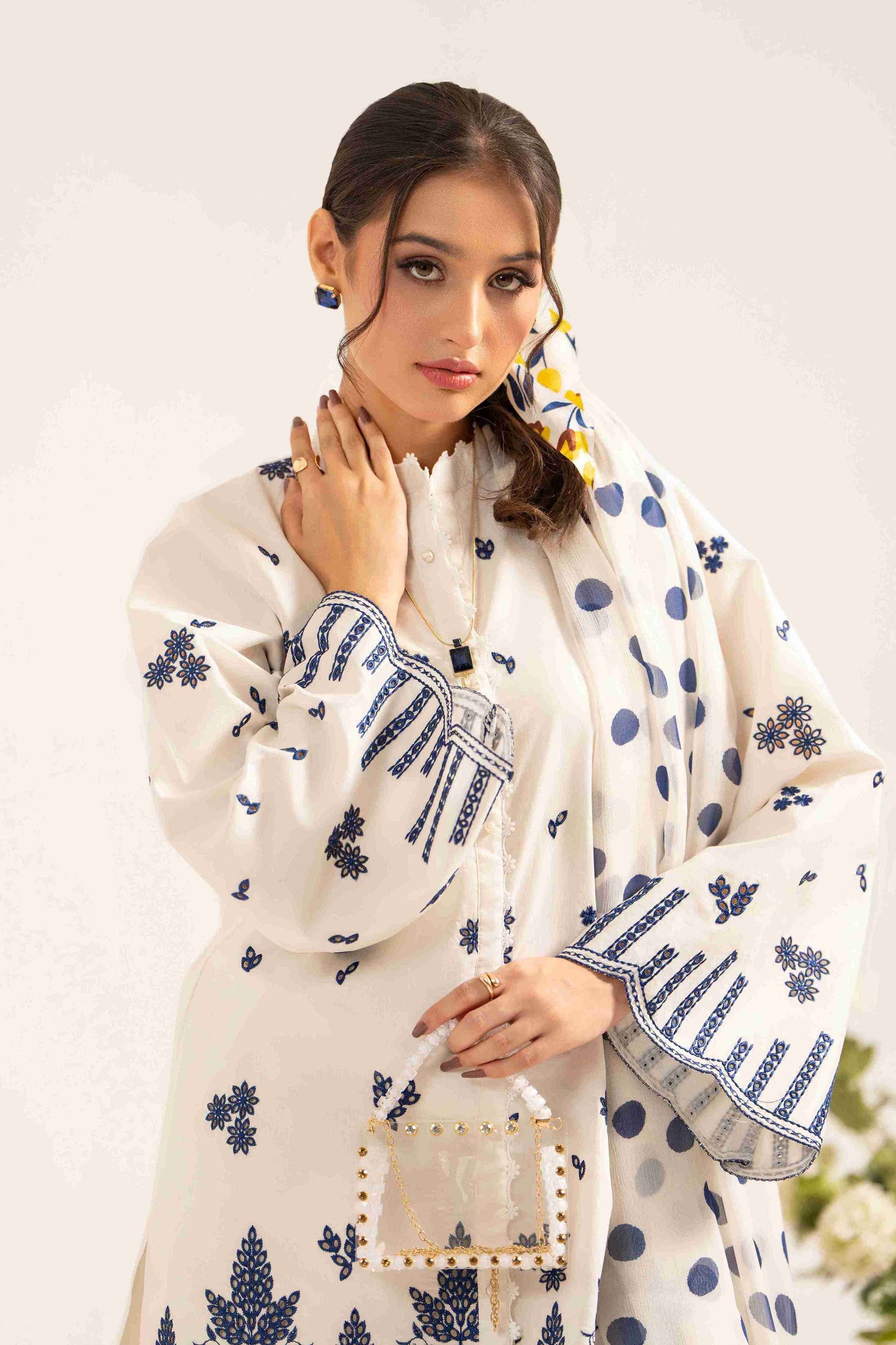 Embroidered lawn shirt designed with digital chiffon dupatta and soft cotton trouser.