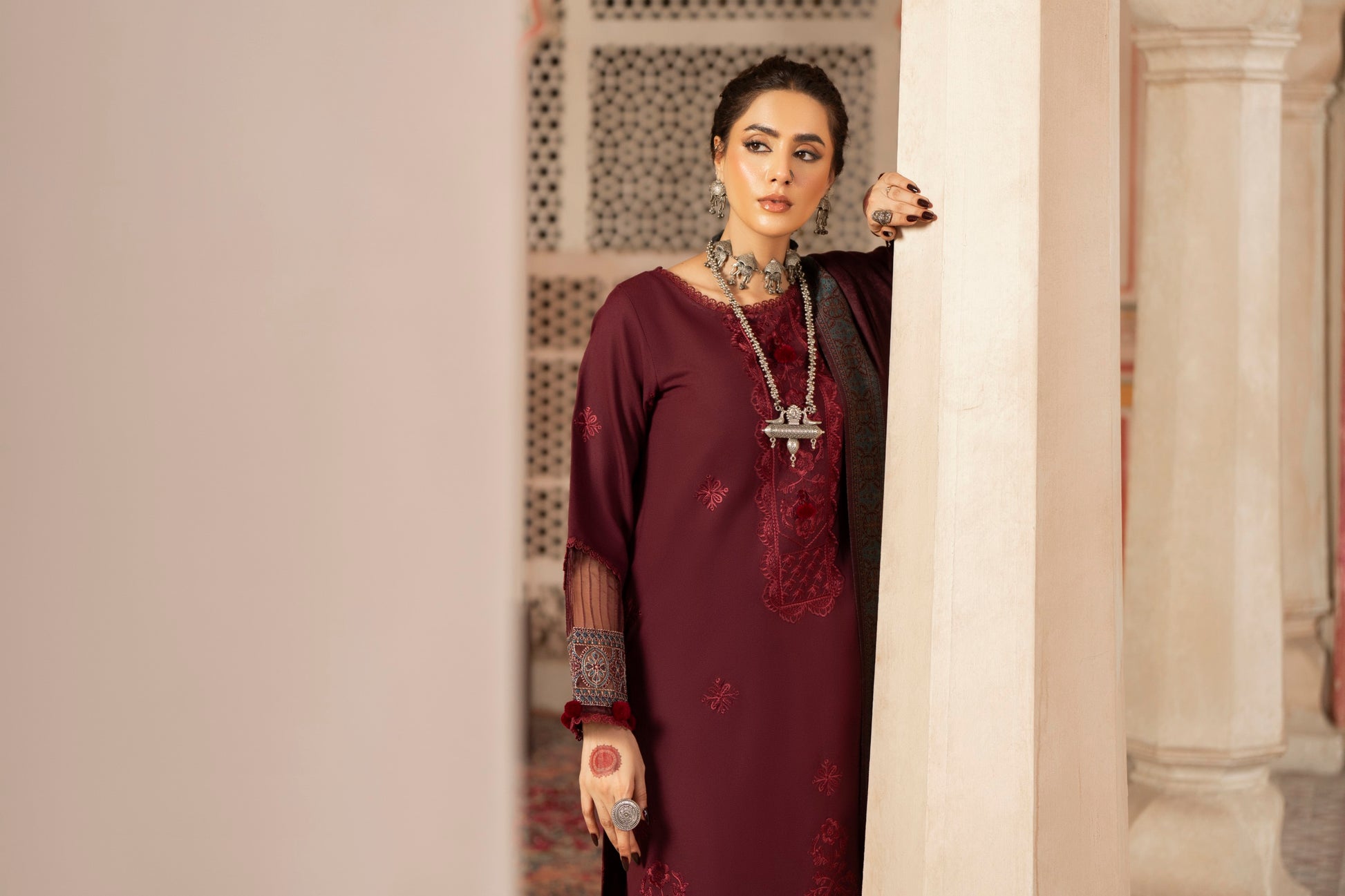 Unstitched embroidered Dhanak winter suit with jacquard shawl and classic trouser.