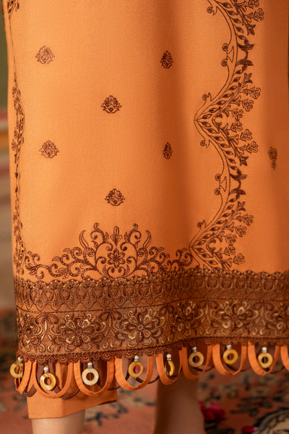 Unstitched embroidered winter Dhanak dress paired with jacquard wool shawl.