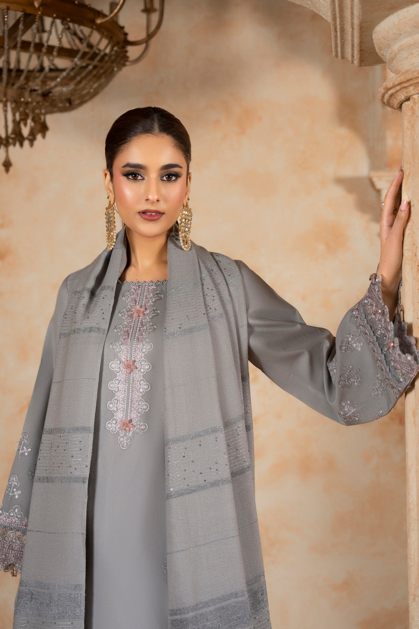 Elegant 3-PC Woolen Suit; Dhanak dress with a plain trouser, balancing the detailed embroidery of the woolen shirt