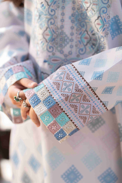 Premium lawn kurta featuring embroidered neckline, chiffon dupatta, and cotton trouser