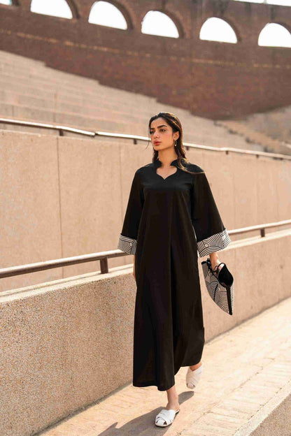 Stitched Jacquard kurta featuring embroidered neckline and bell sleeves for women