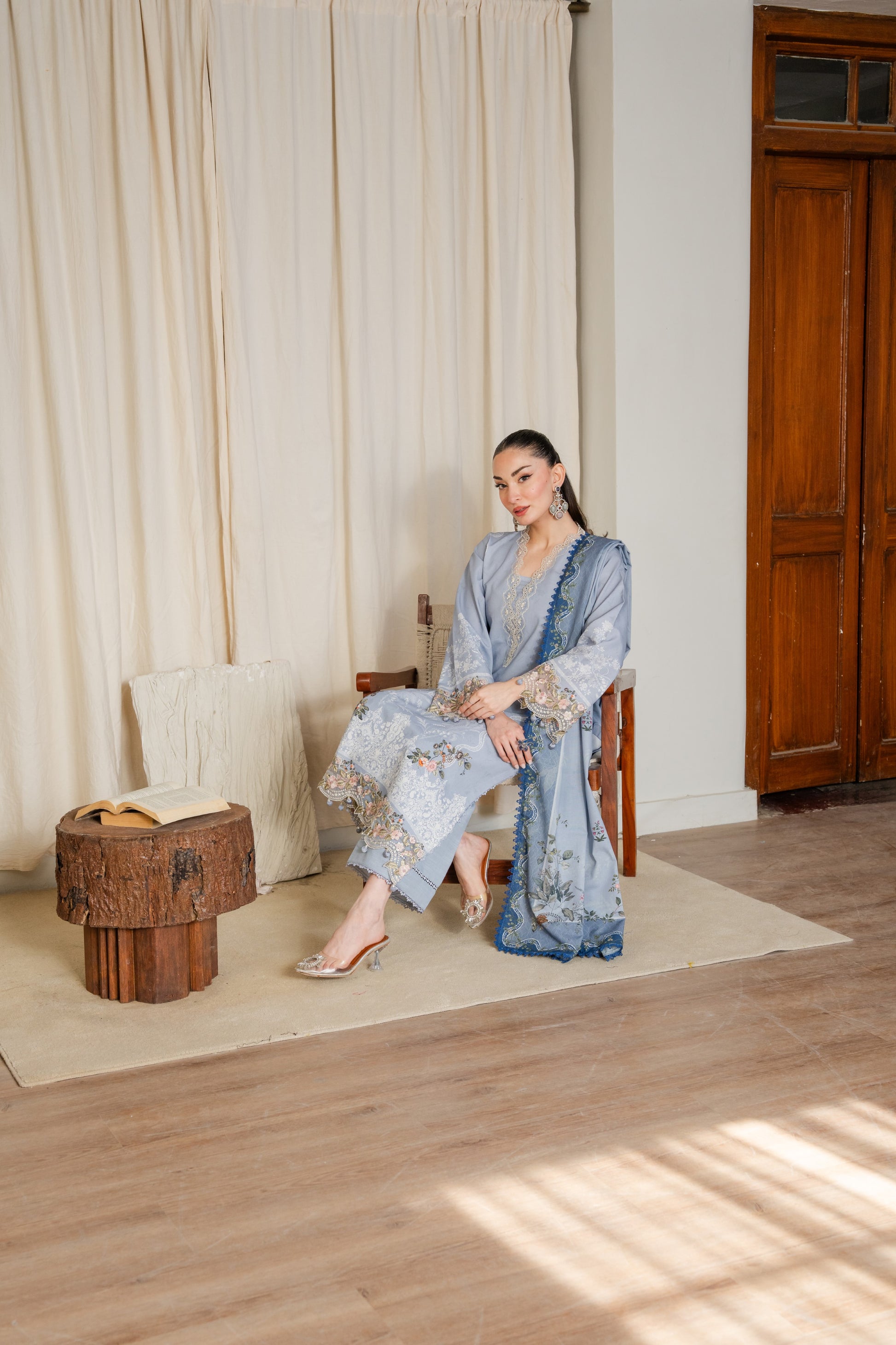 Stylish winter khaddar outfit with organza embroidery and colorful dupatta.