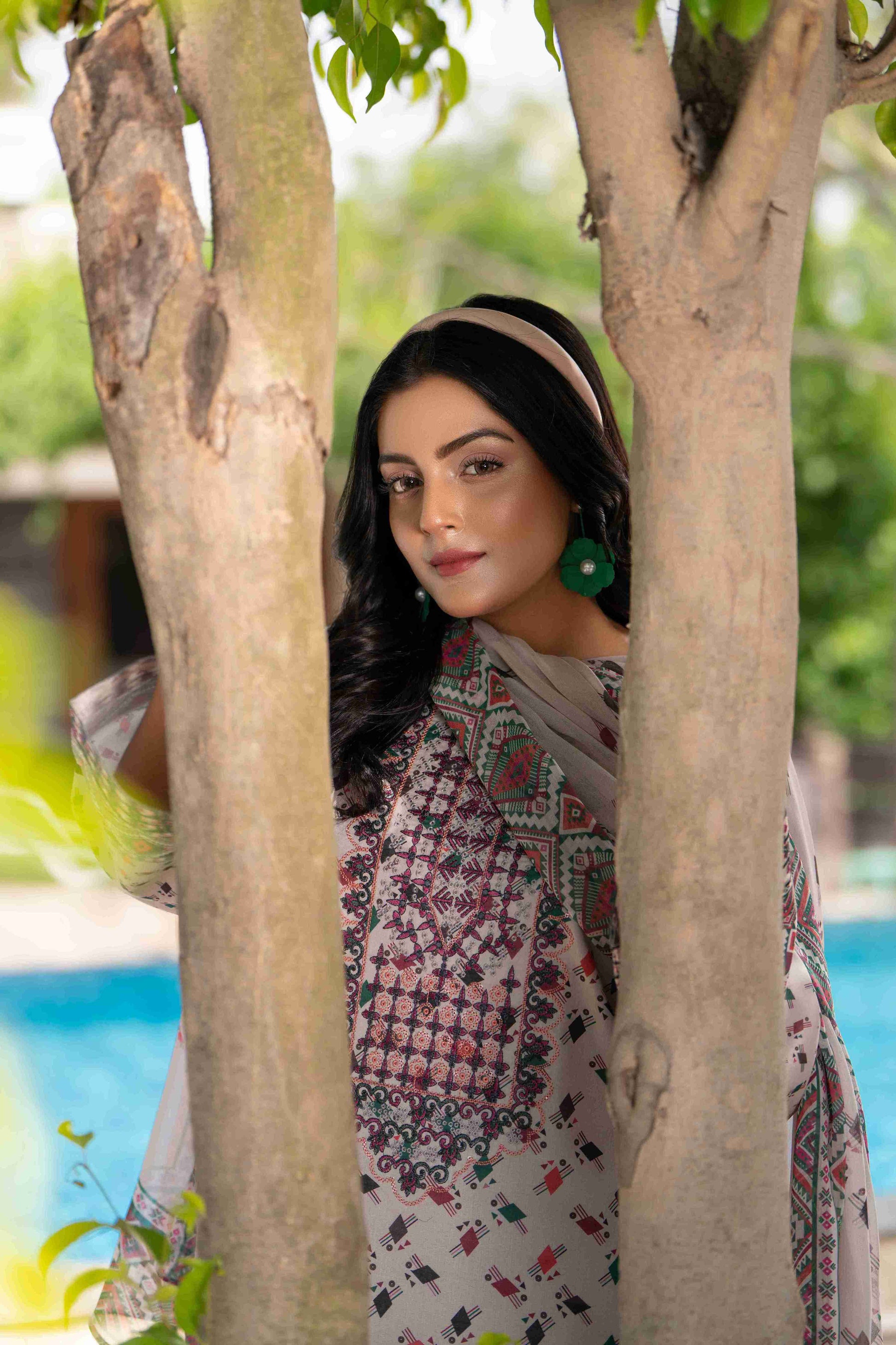 Premium pastel-toned lawn outfit with embroidery, chiffon dupatta, and cotton trouser