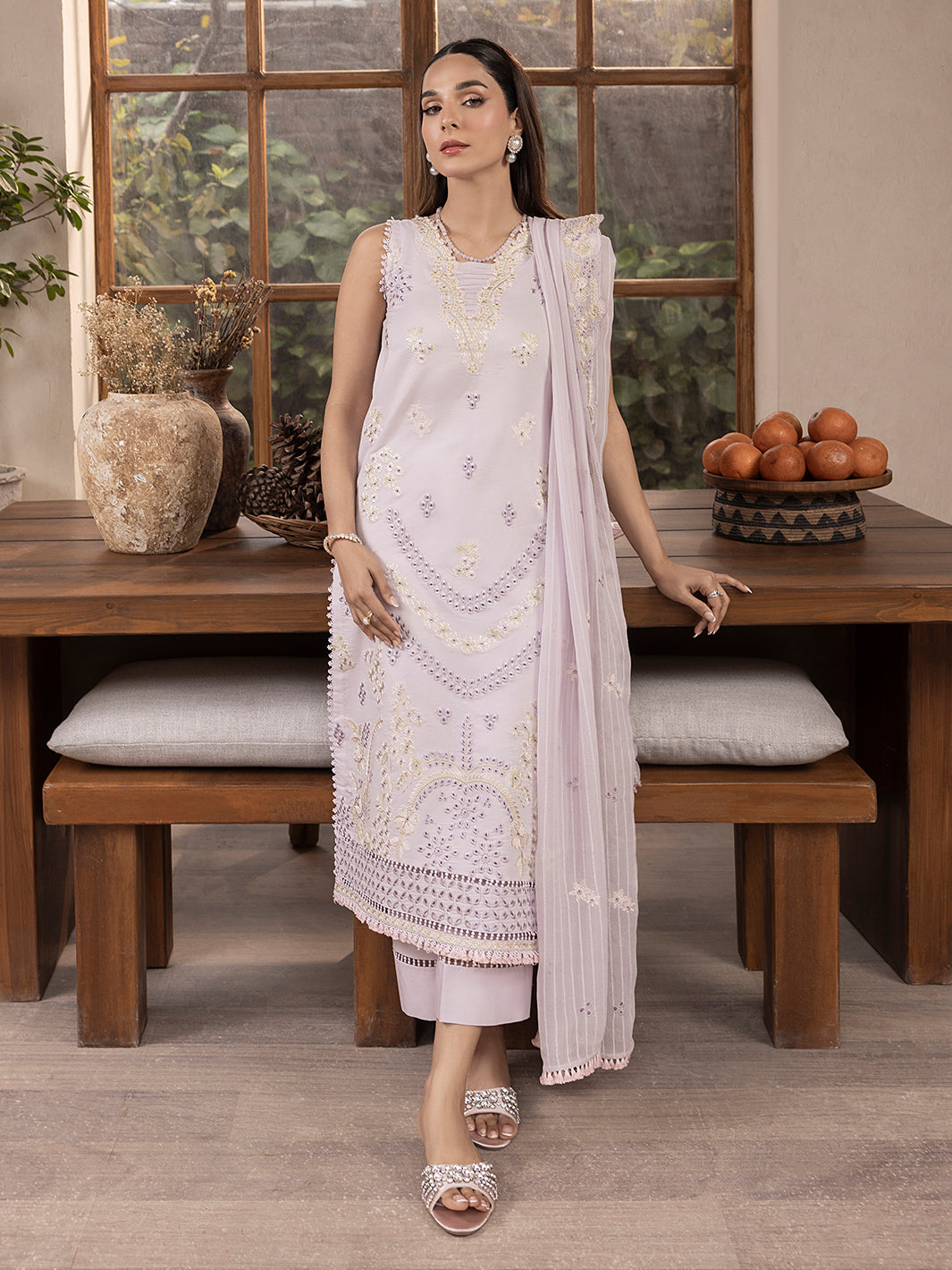 Printed lawn kurta with embroidered sleeves, chiffon dupatta, and cotton trouser