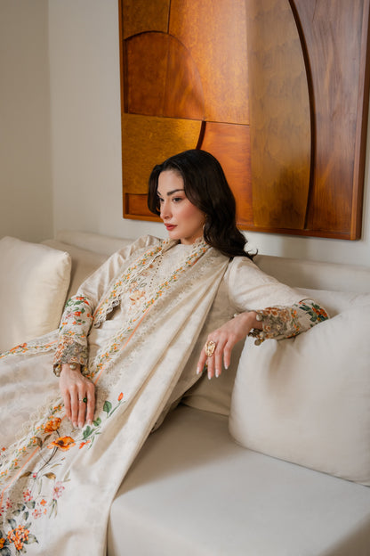 Stylish khaddar dress with winter print and organza neckline embroidery.