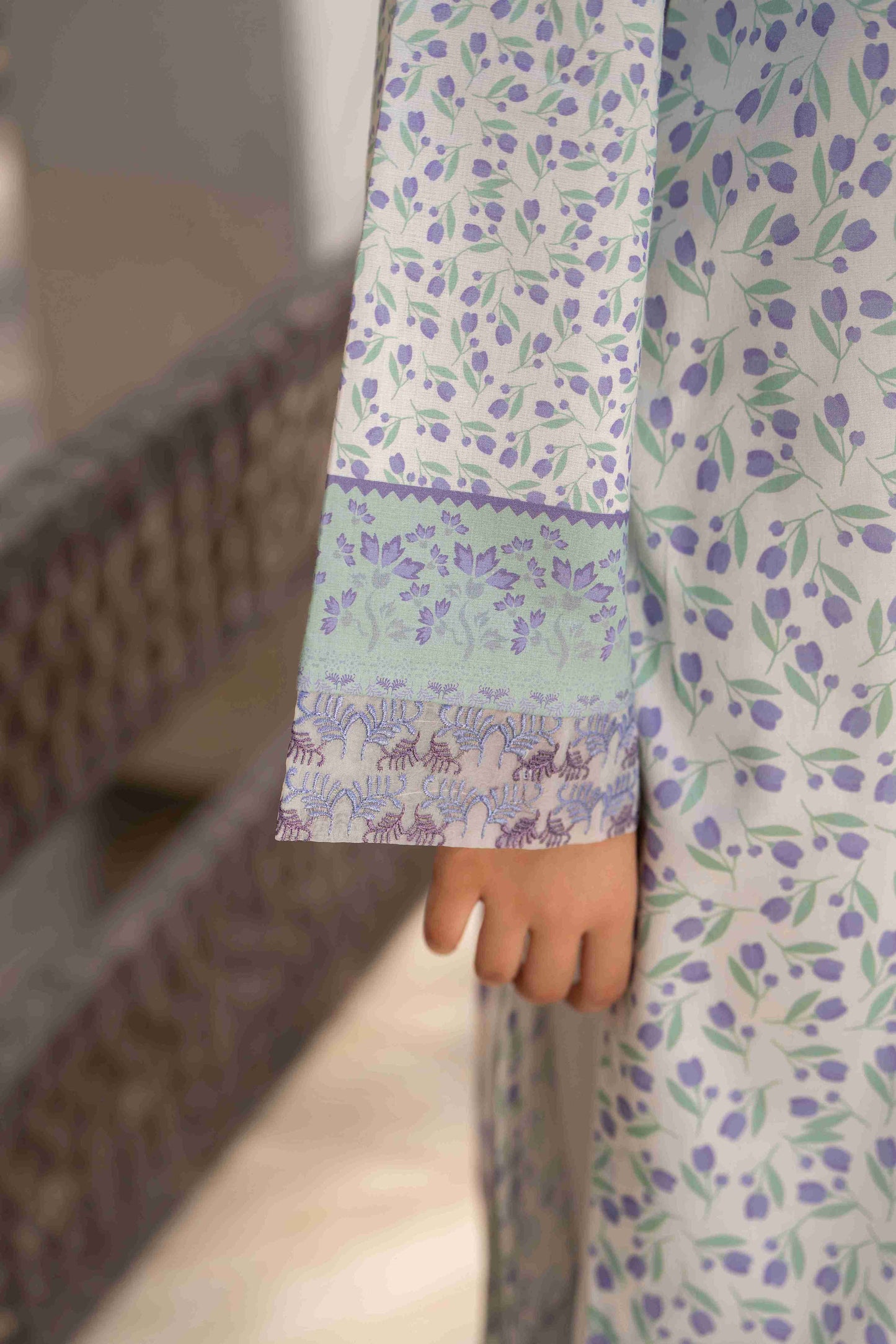 Richly colored kurta made from branded lawn, styled with chiffon dupatta and embroidered neckline