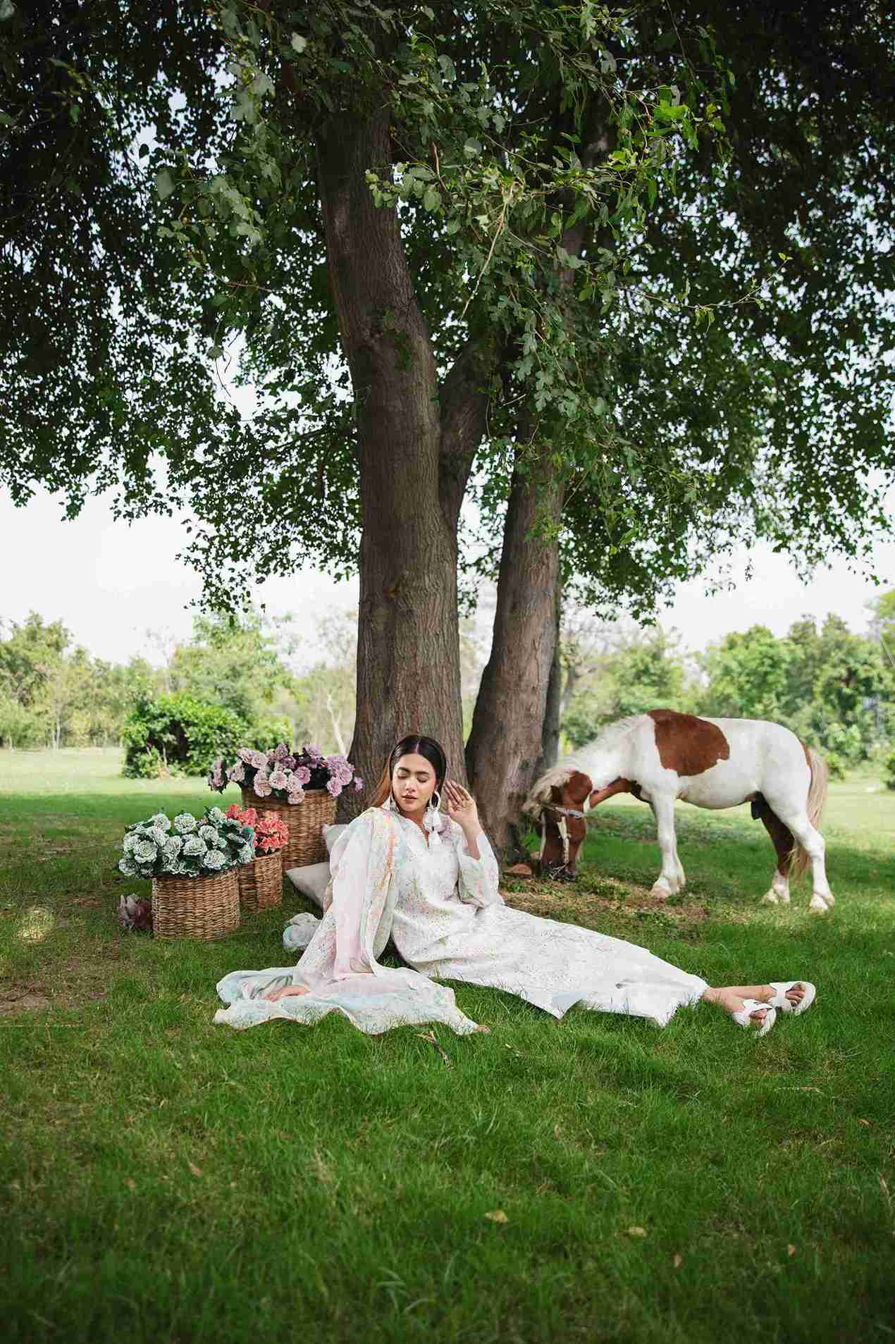 Embroidered lawn kurta with chiffon dupatta and plain cotton trouser.