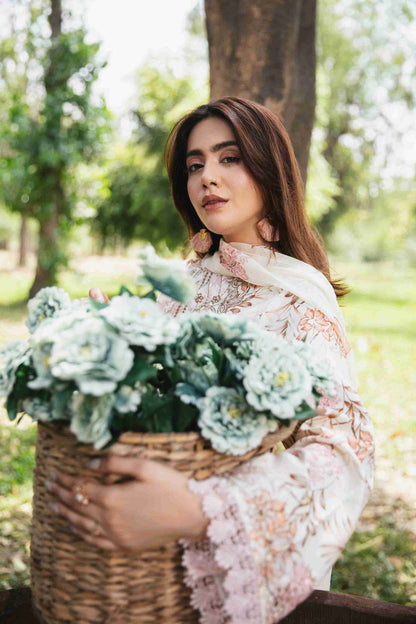  Embroidered lawn shirt styled with chiffon dupatta and plain cotton trouser.